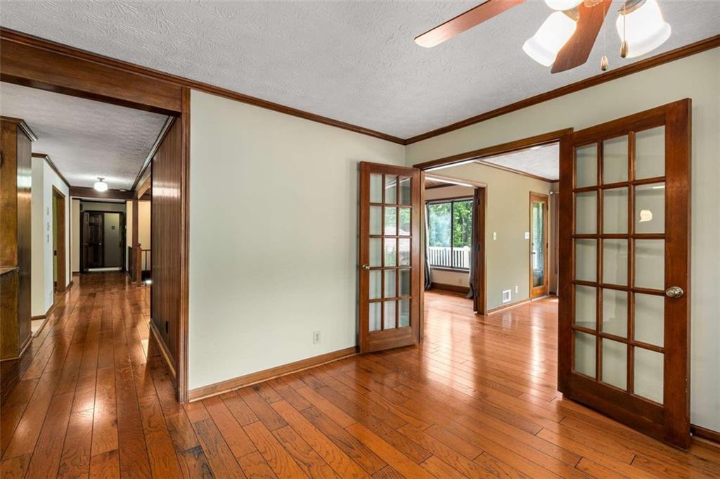 1535 Pathfinder Way Southwest Lilburn, GA 30047 - Photo 18 of 58 a view of gallery with wooden floor