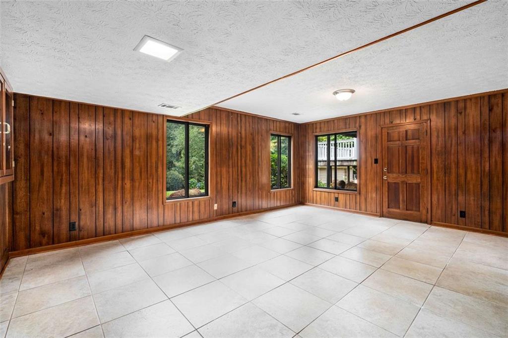 1535 Pathfinder Way Southwest Lilburn, GA 30047 - Photo 35 of 58 a view of an empty room with windows