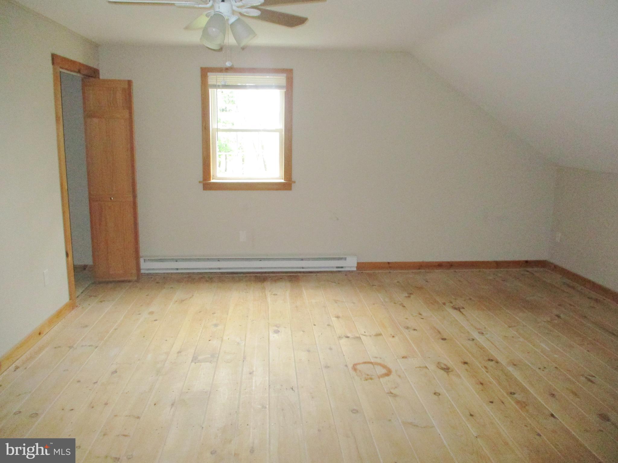 18 Airport Road Bethel, PA 19507 - Photo 11 of 12 an empty room with a window