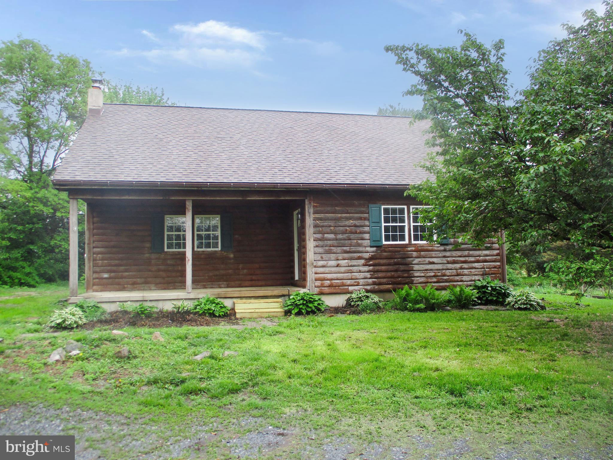 18 Airport Road Bethel, PA 19507 - Photo 2 of 12 a backyard of a house with lots of green space