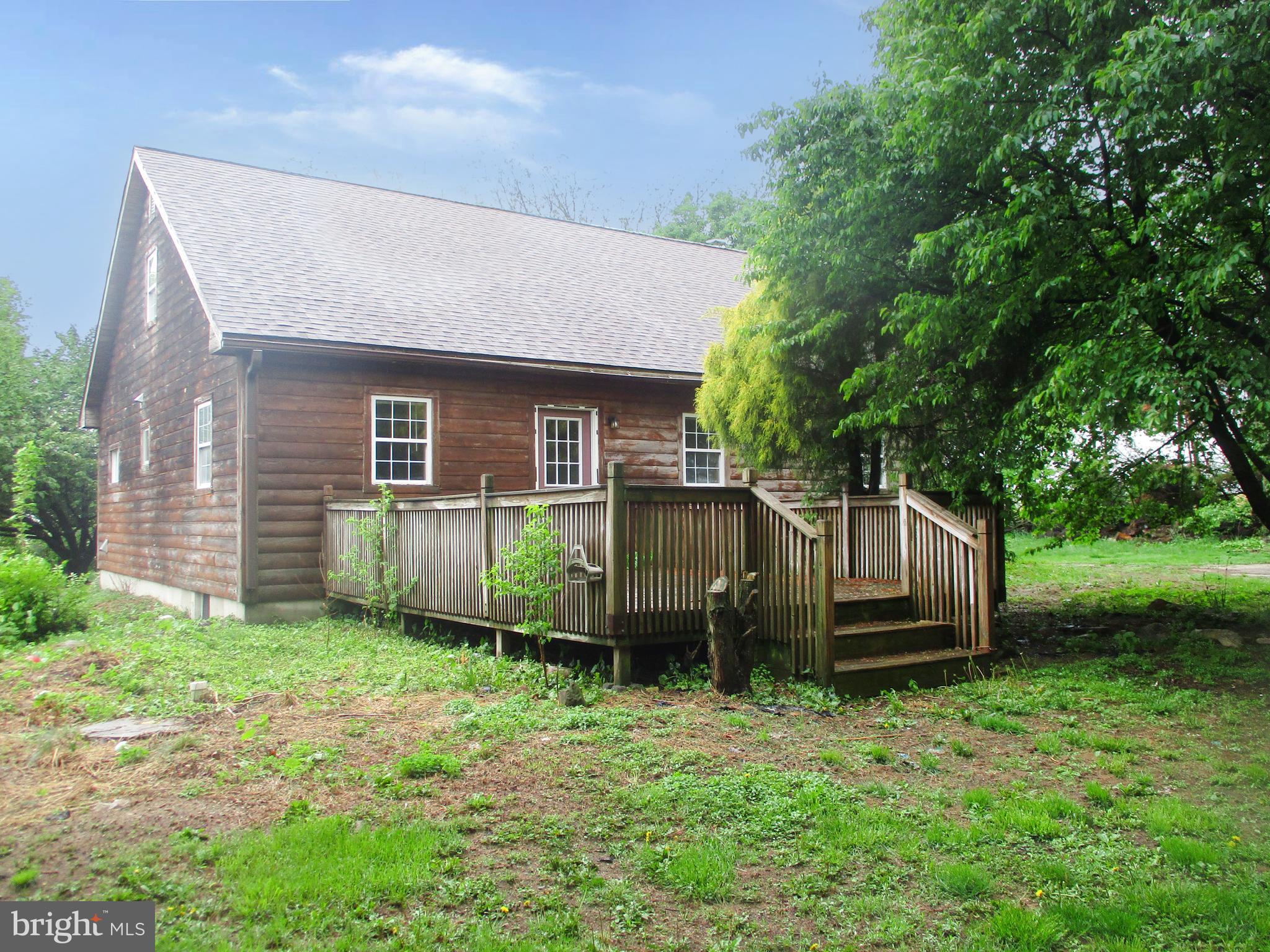 18 Airport Road Bethel, PA 19507 - Photo 3 of 12 a view of a house with a backyard