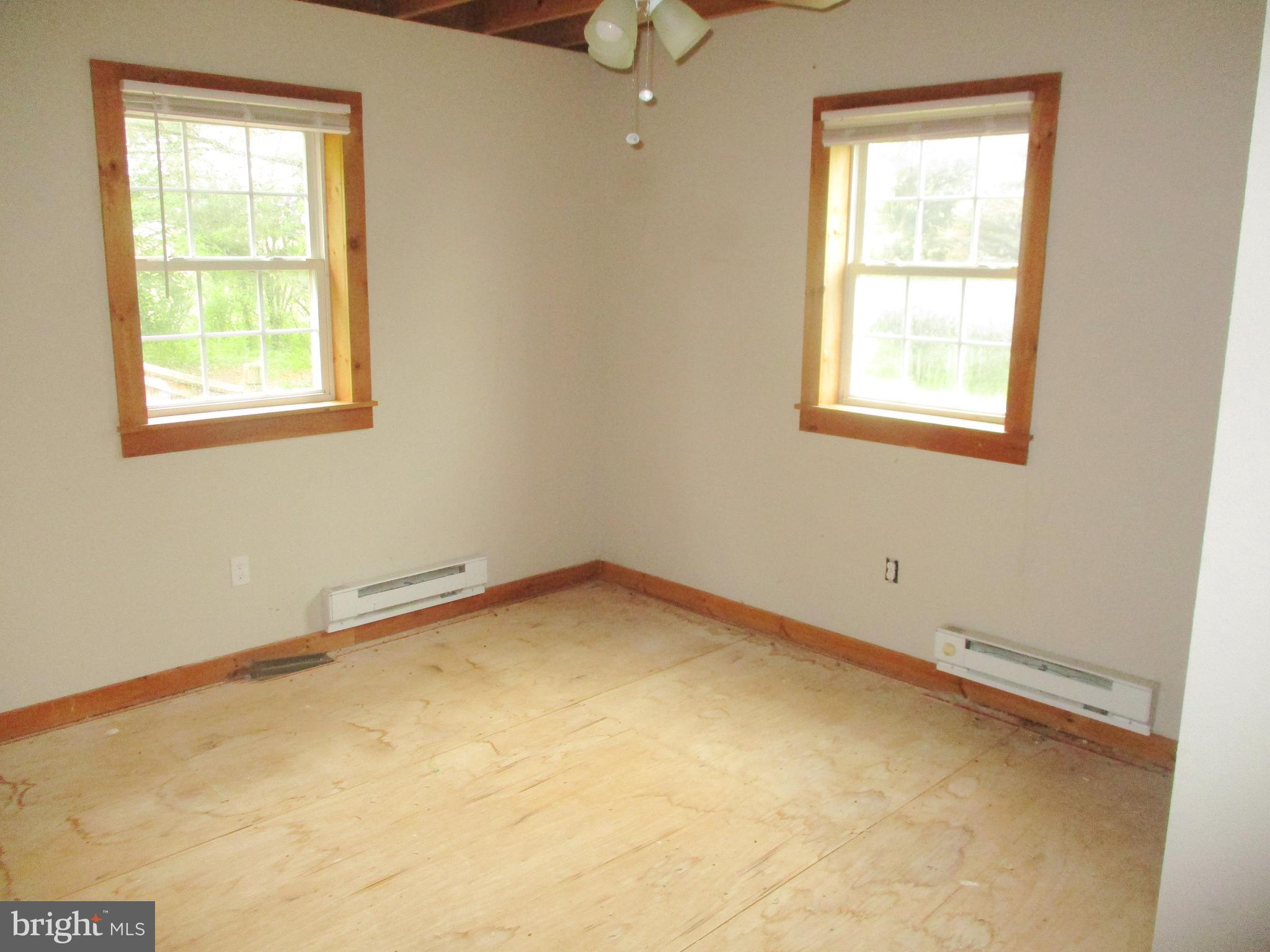 18 Airport Road Bethel, PA 19507 - Photo 6 of 12 an empty room with a window