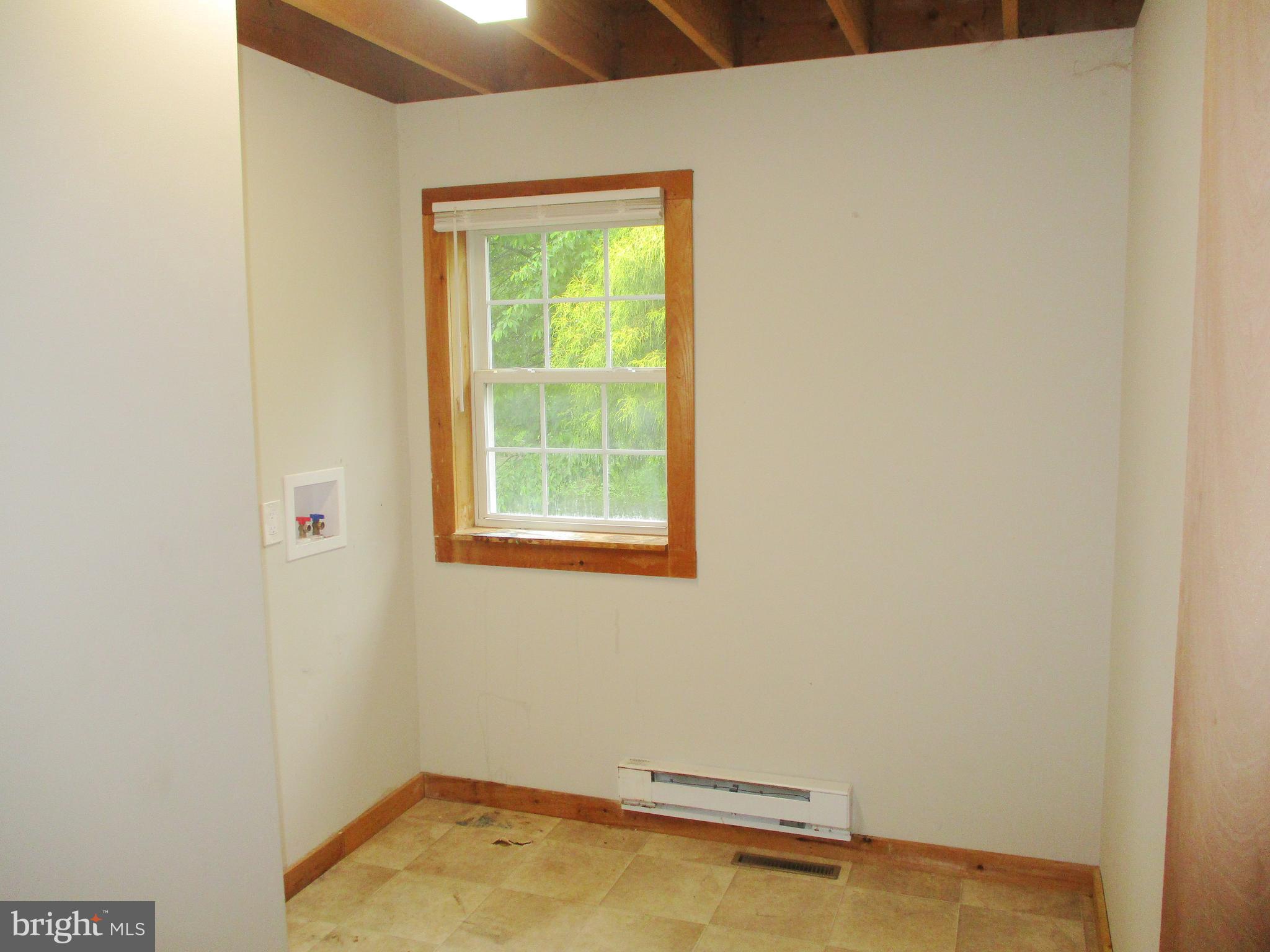 18 Airport Road Bethel, PA 19507 - Photo 7 of 12 a view of a room with a window