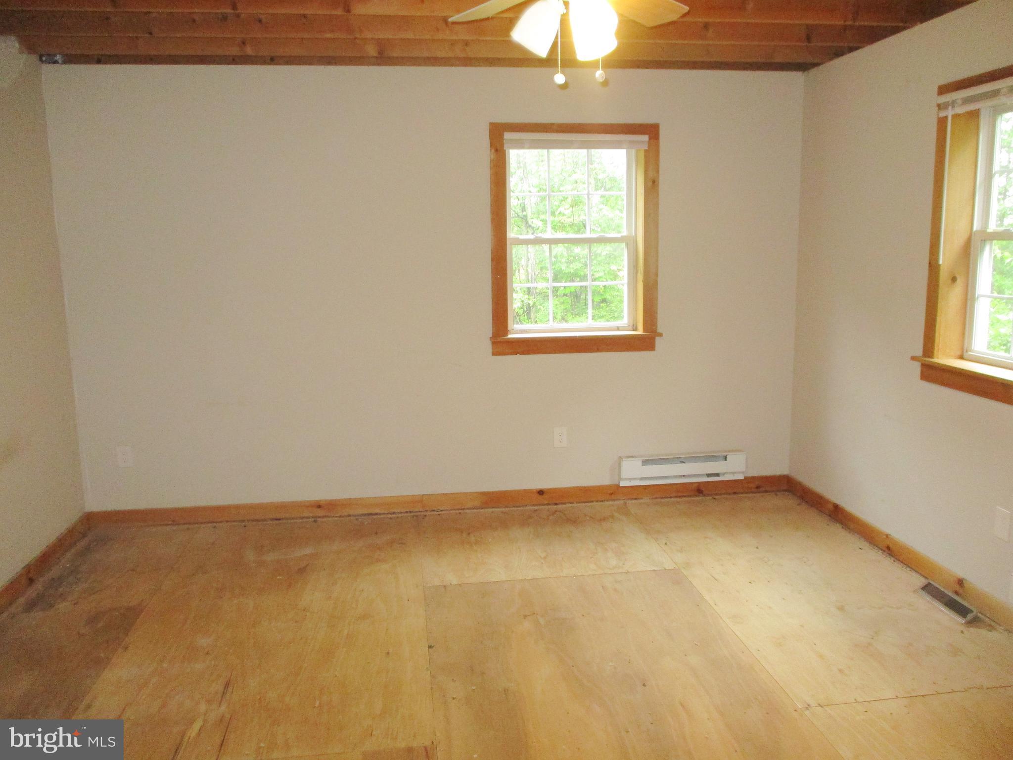 18 Airport Road Bethel, PA 19507 - Photo 9 of 12 an empty room with a window