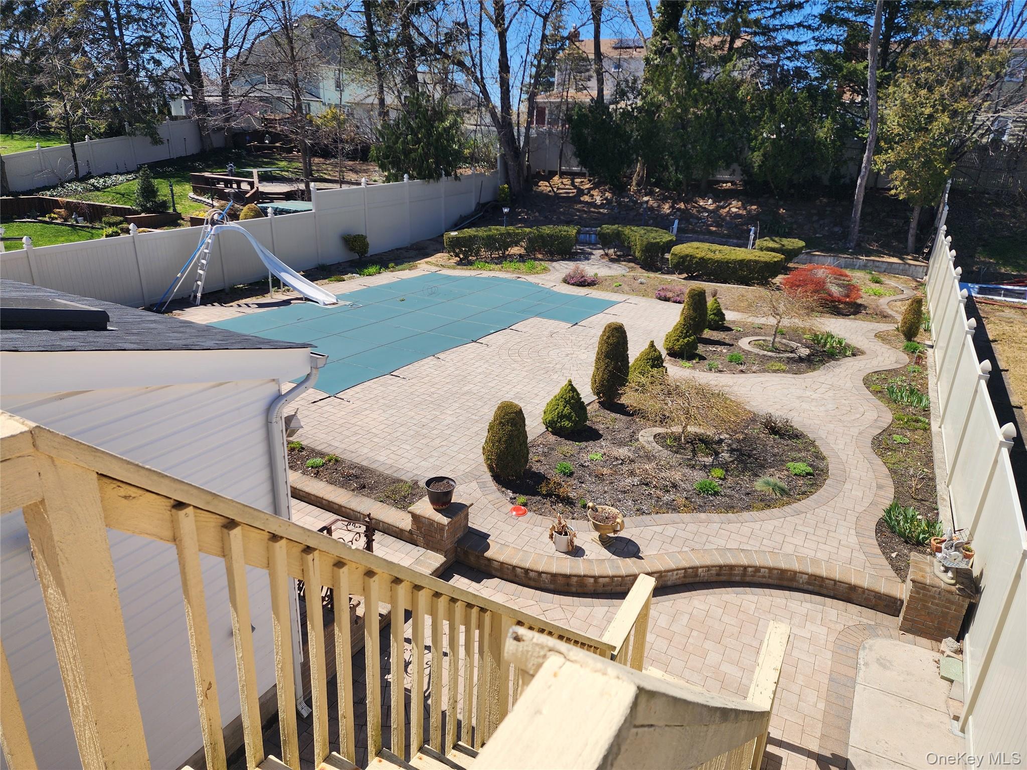 441 Morris Drive Valley Stream, NY 11580 - Photo 11 of 15 a view of swimming pool with outdoor seating