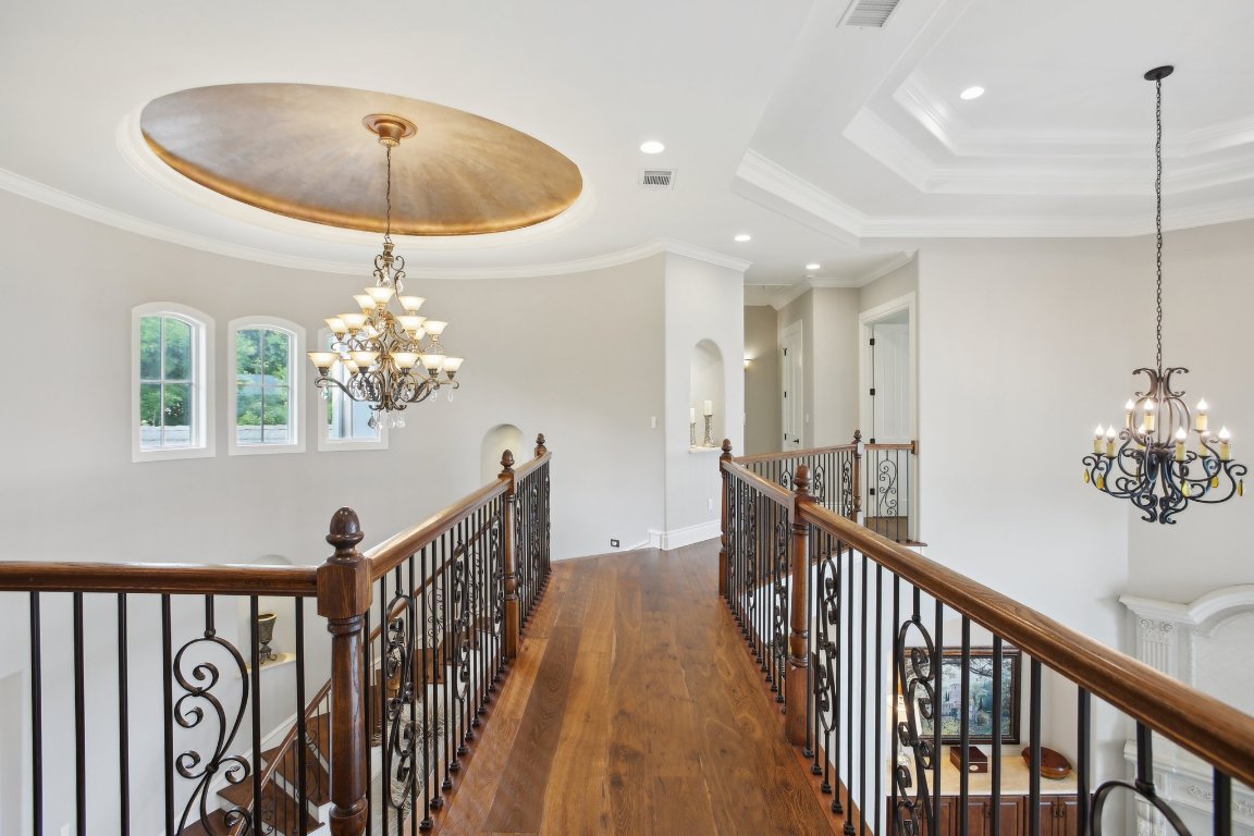 1353 Osprey Ridge Loop Lago Vista, TX 78645 - Photo 19 of 40 a view of a chandelier and hallway