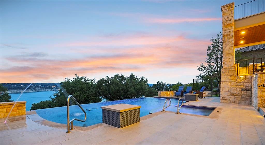 1353 Osprey Ridge Loop Lago Vista, TX 78645 - Photo 5 of 40 a view of swimming pool with a lounge chairs