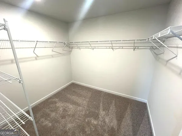 a view of a room with racks on the wall