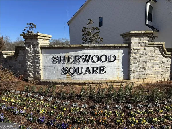 a outdoor space with a sign broad