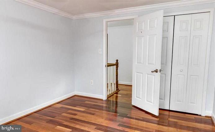 1744 Carry Place Crofton, MD 21114 - Photo 12 of 22 a view of empty room with wooden floor