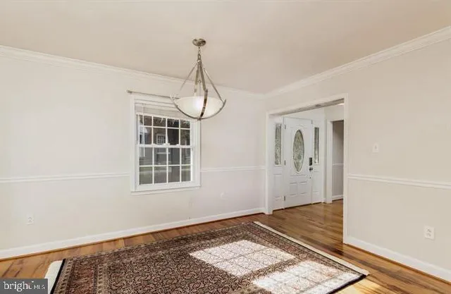 a view of a room with a front door