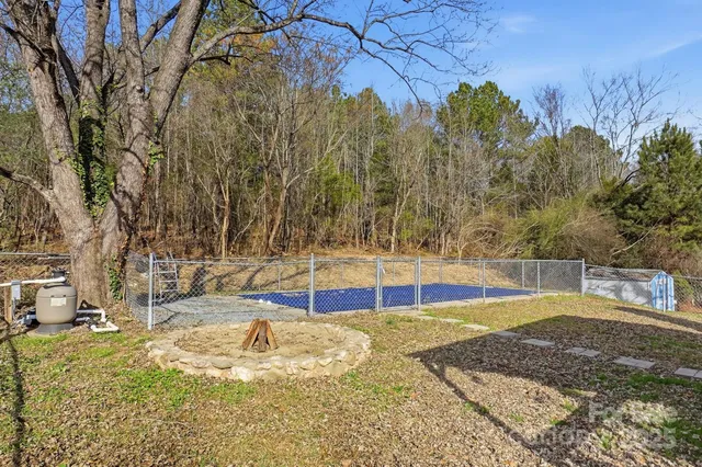 a view of a swimming pool with an outdoor space