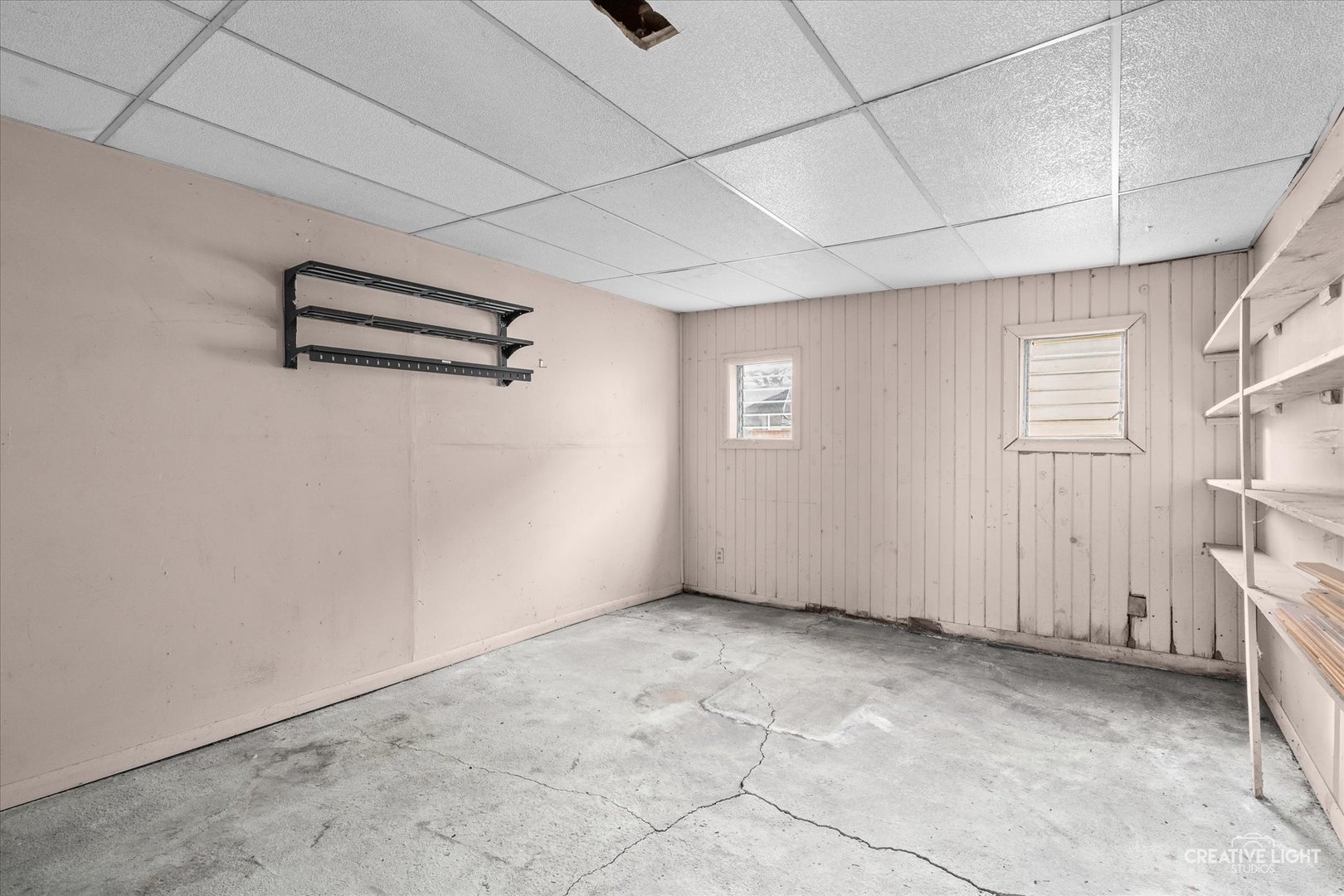 413 East Kansas Street Elburn, IL 60119 - Photo 15 of 18 a view of a livingroom with an empty space and a window