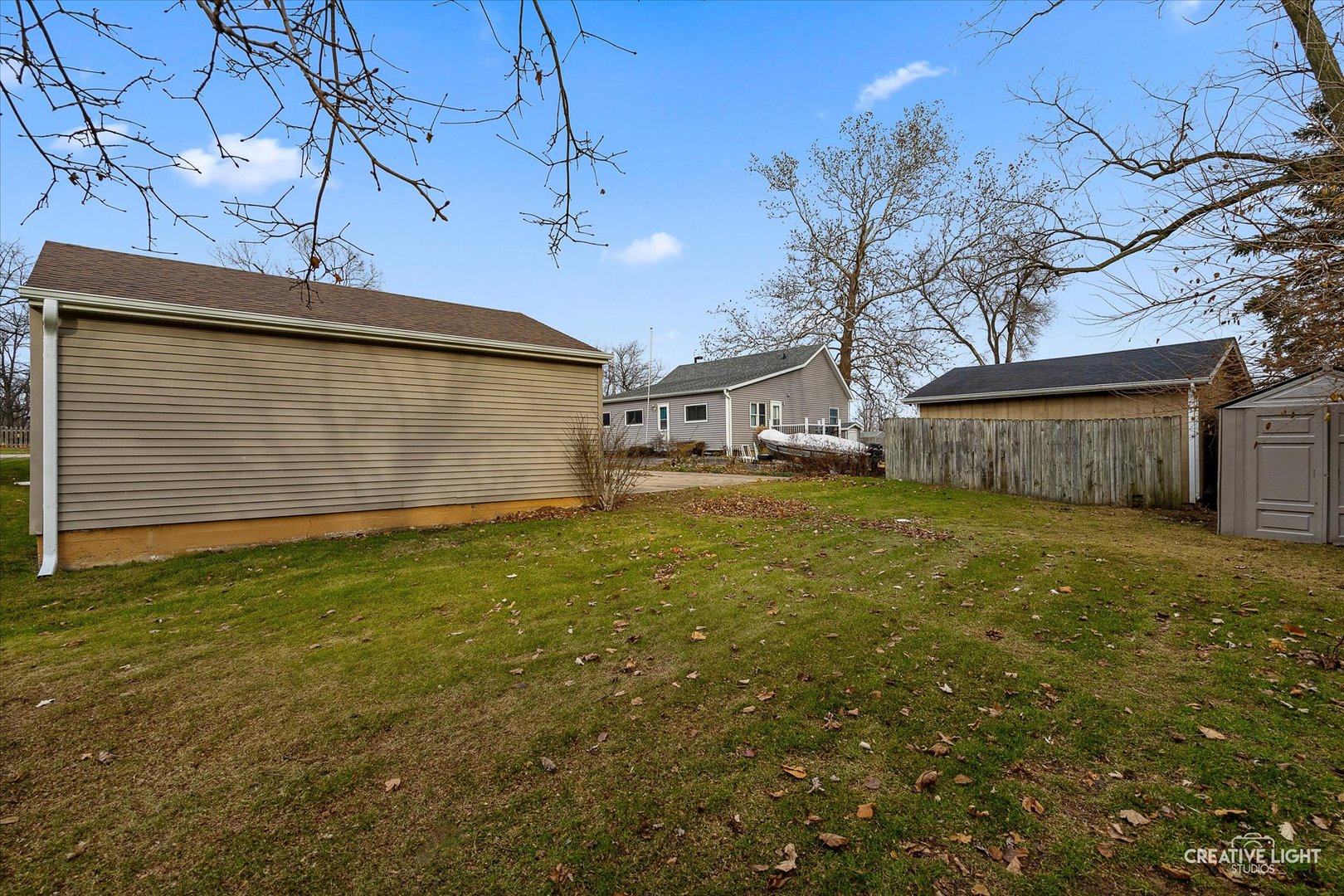 413 East Kansas Street Elburn, IL 60119 - Photo 16 of 18 a front view of house with yard