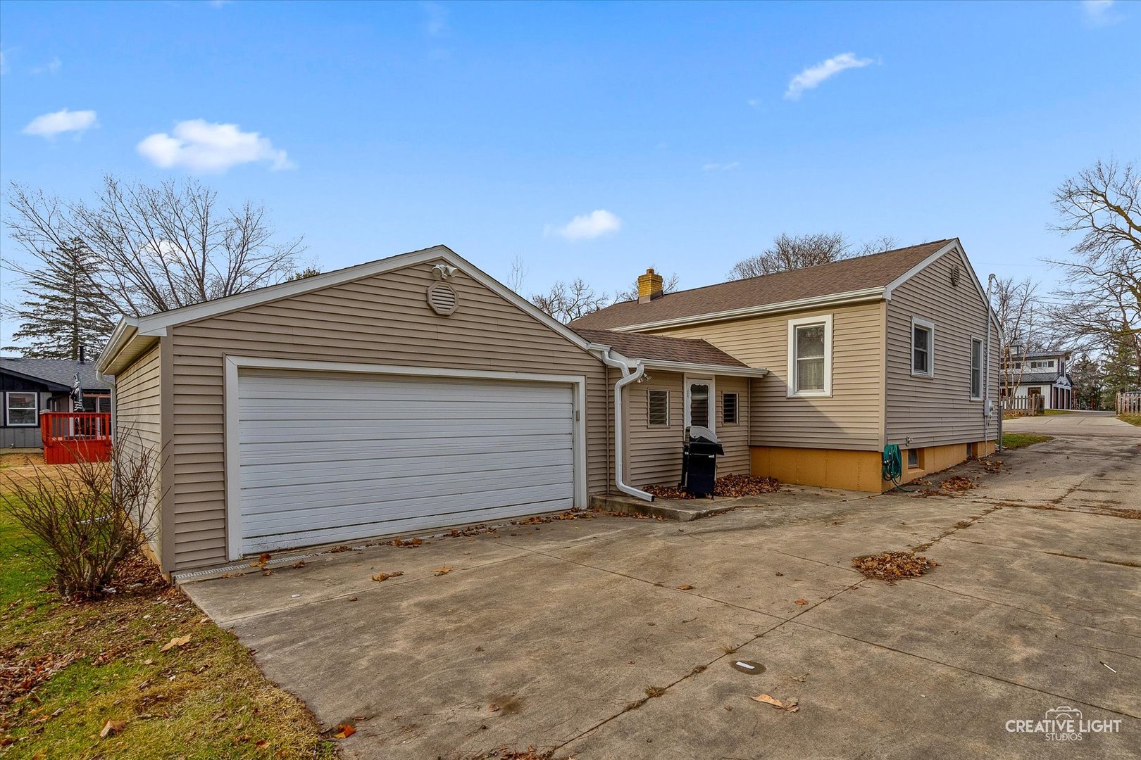413 East Kansas Street Elburn, IL 60119 - Photo 3 of 18 a view of a house with a yard