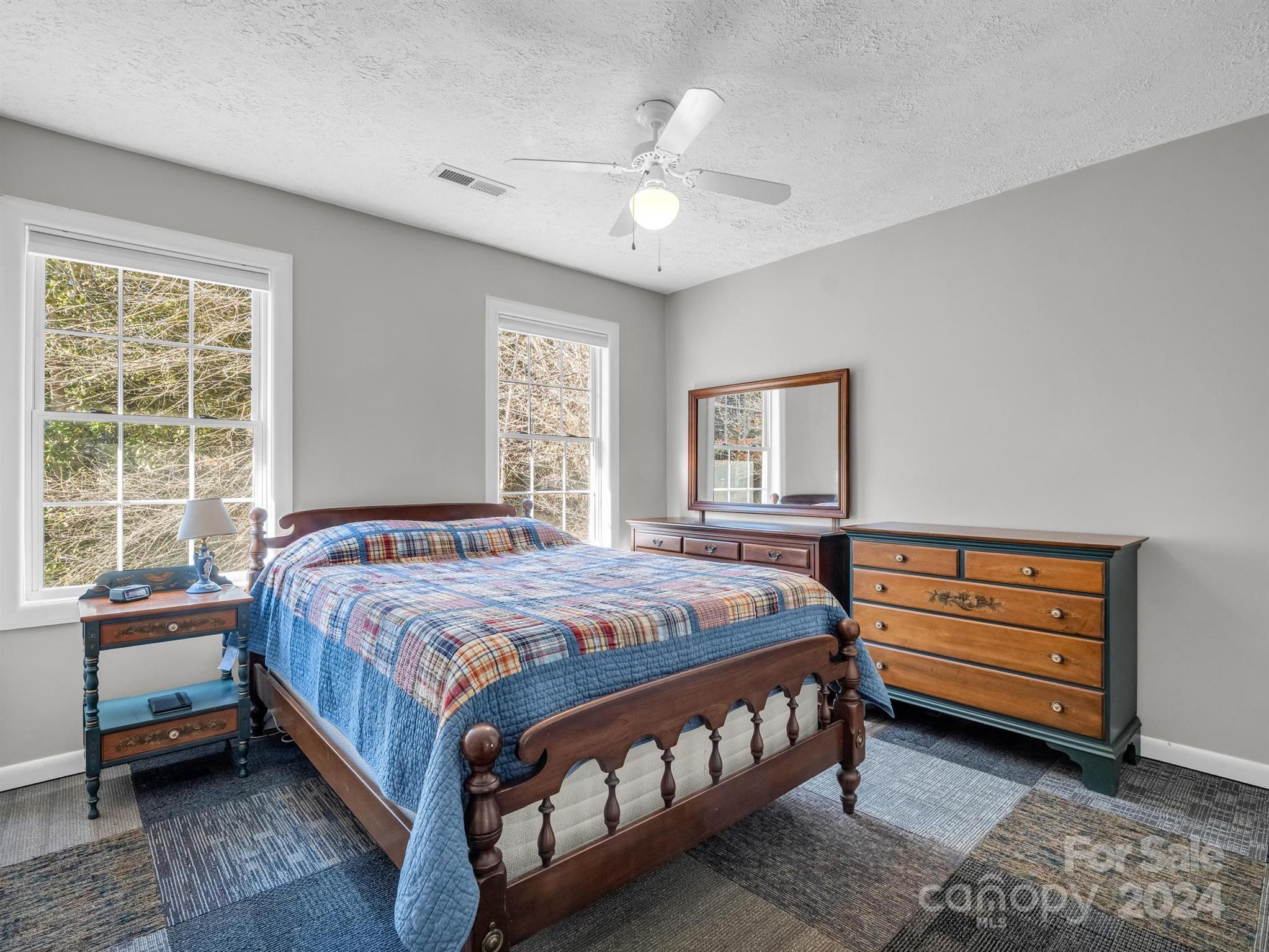284 West T Wilkins Road Rutherfordton, NC 28139 - Photo 23 of 44 a bedroom with a bed and a window