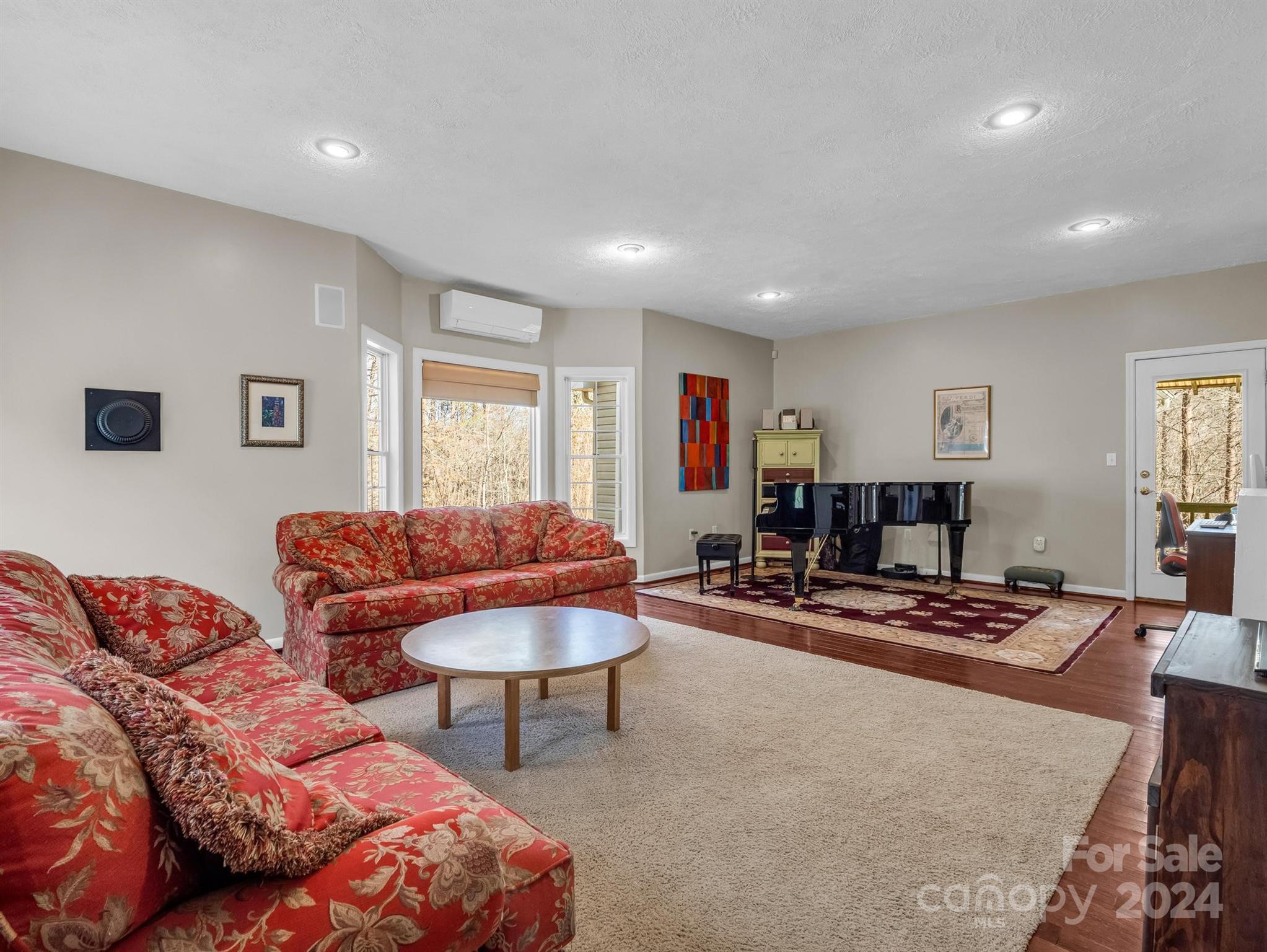 284 West T Wilkins Road Rutherfordton, NC 28139 - Photo 3 of 44 a living room with furniture and a flat screen tv