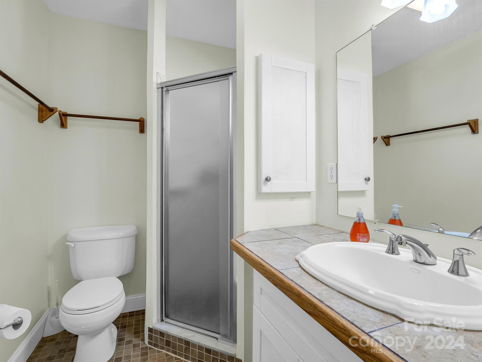 284 West T Wilkins Road Rutherfordton, NC 28139 - Photo 35 of 44 a bathroom with a sink toilet and shower