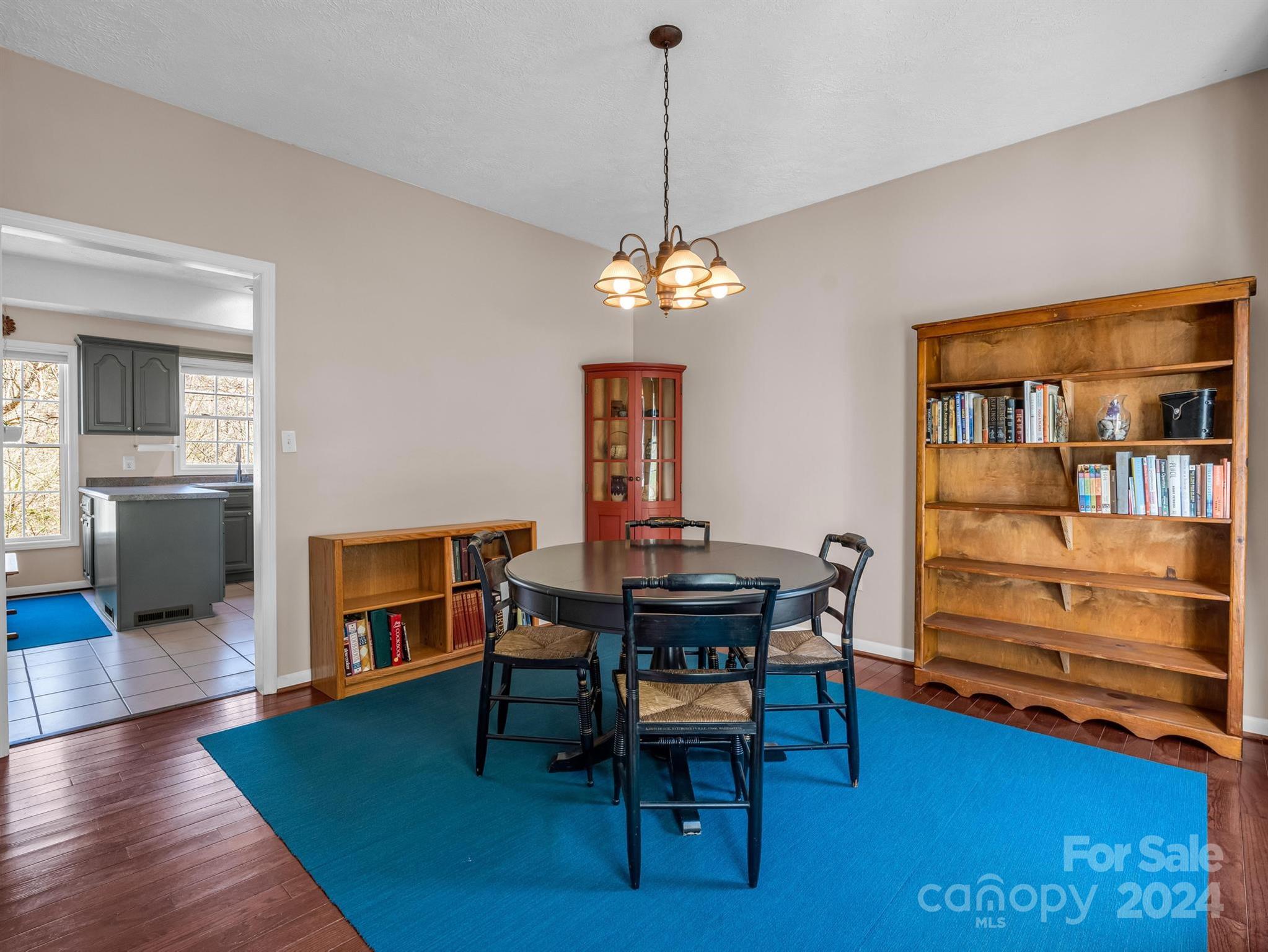 284 West T Wilkins Road Rutherfordton, NC 28139 - Photo 8 of 44 a view of a dining room with furniture and wooden floor