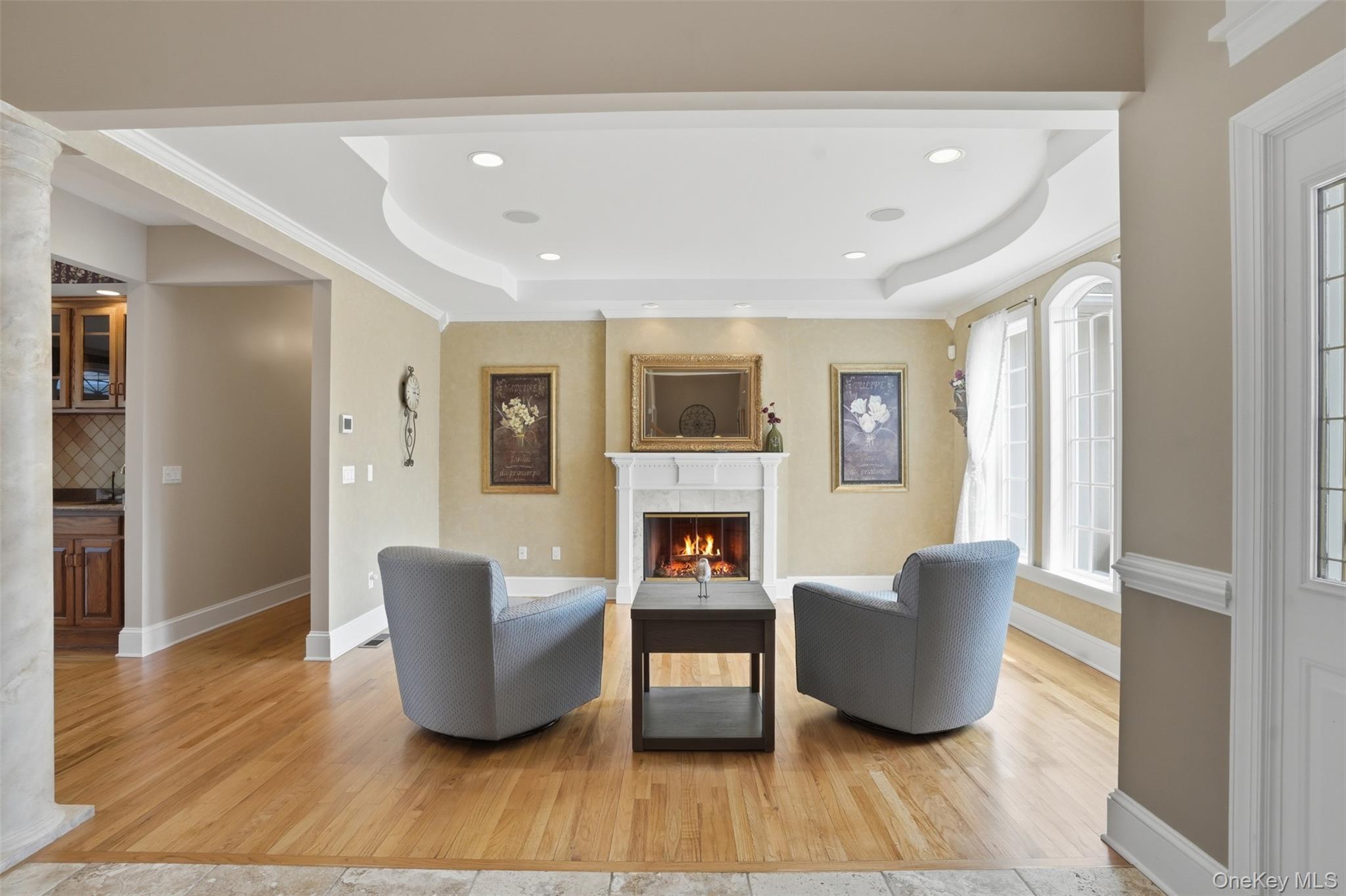 17 Forrest Way Poughkeepsie, NY 12603 - Photo 11 of 50 a living room with fireplace furniture and a wooden floor