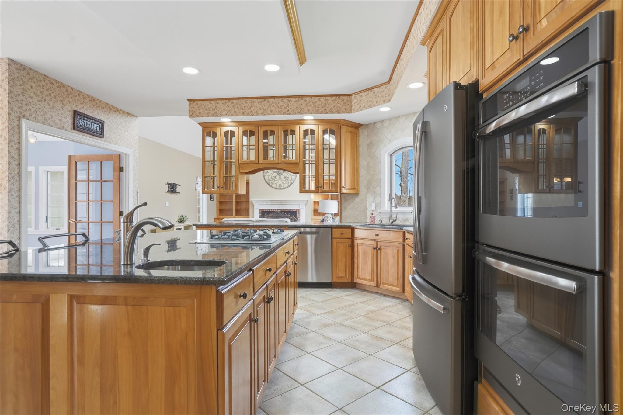 17 Forrest Way Poughkeepsie, NY 12603 - Photo 16 of 50 a kitchen with a sink stove and refrigerator