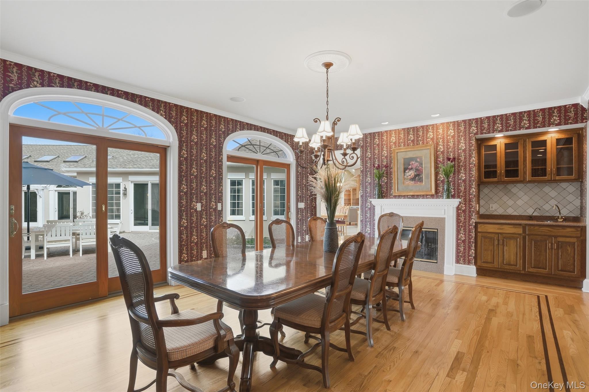 17 Forrest Way Poughkeepsie, NY 12603 - Photo 24 of 50 a view of a dining room with furniture wooden floor and chandelier