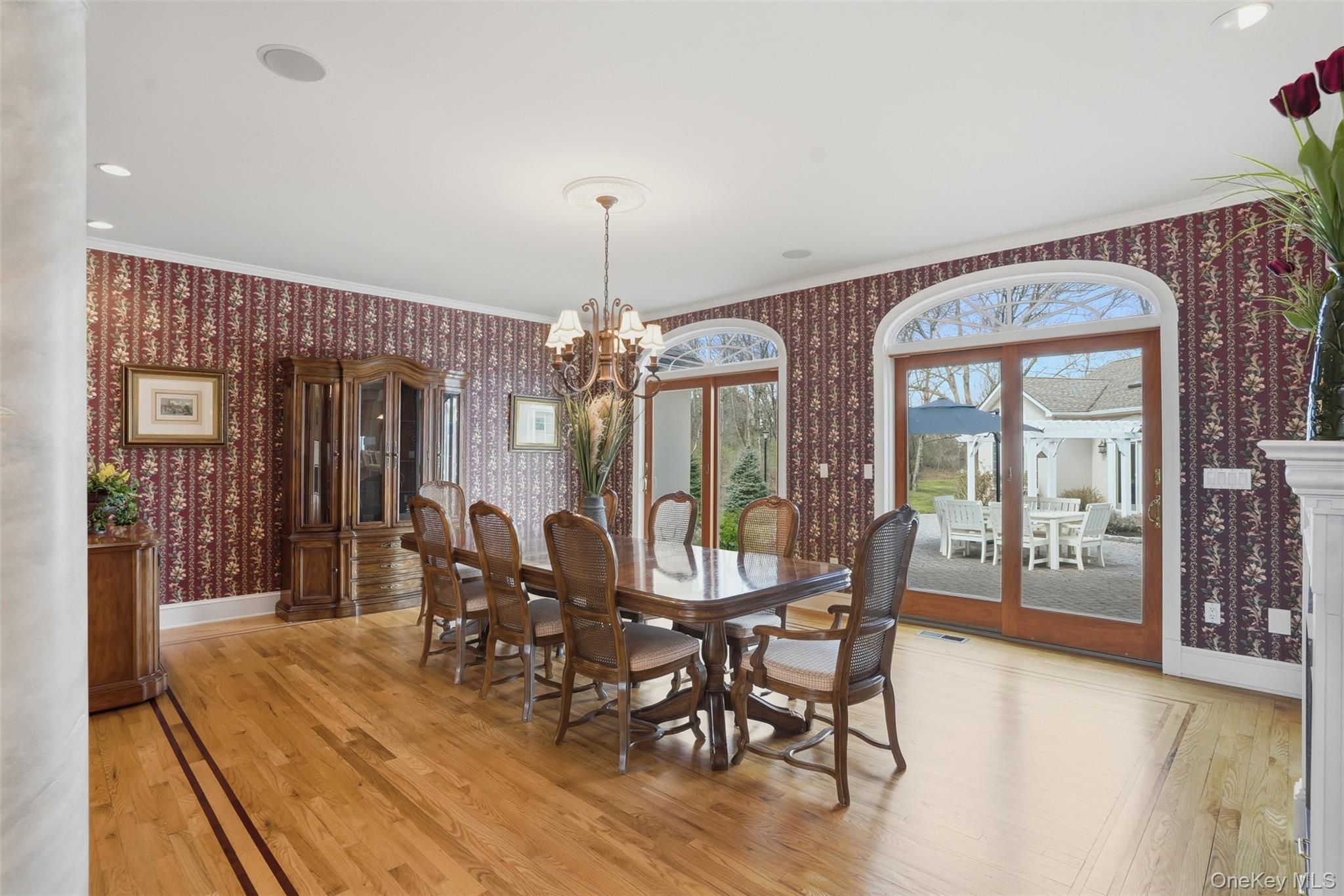 17 Forrest Way Poughkeepsie, NY 12603 - Photo 25 of 50 a view of a dining room with furniture wooden floor and chandelier