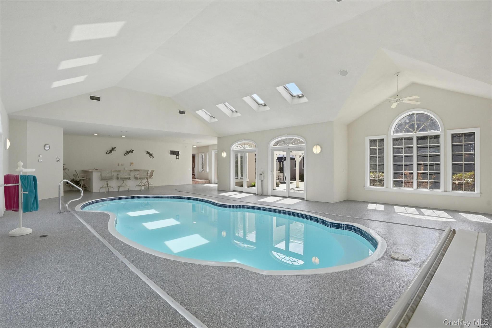 17 Forrest Way Poughkeepsie, NY 12603 - Photo 27 of 50 a large pool with a large screen and couches