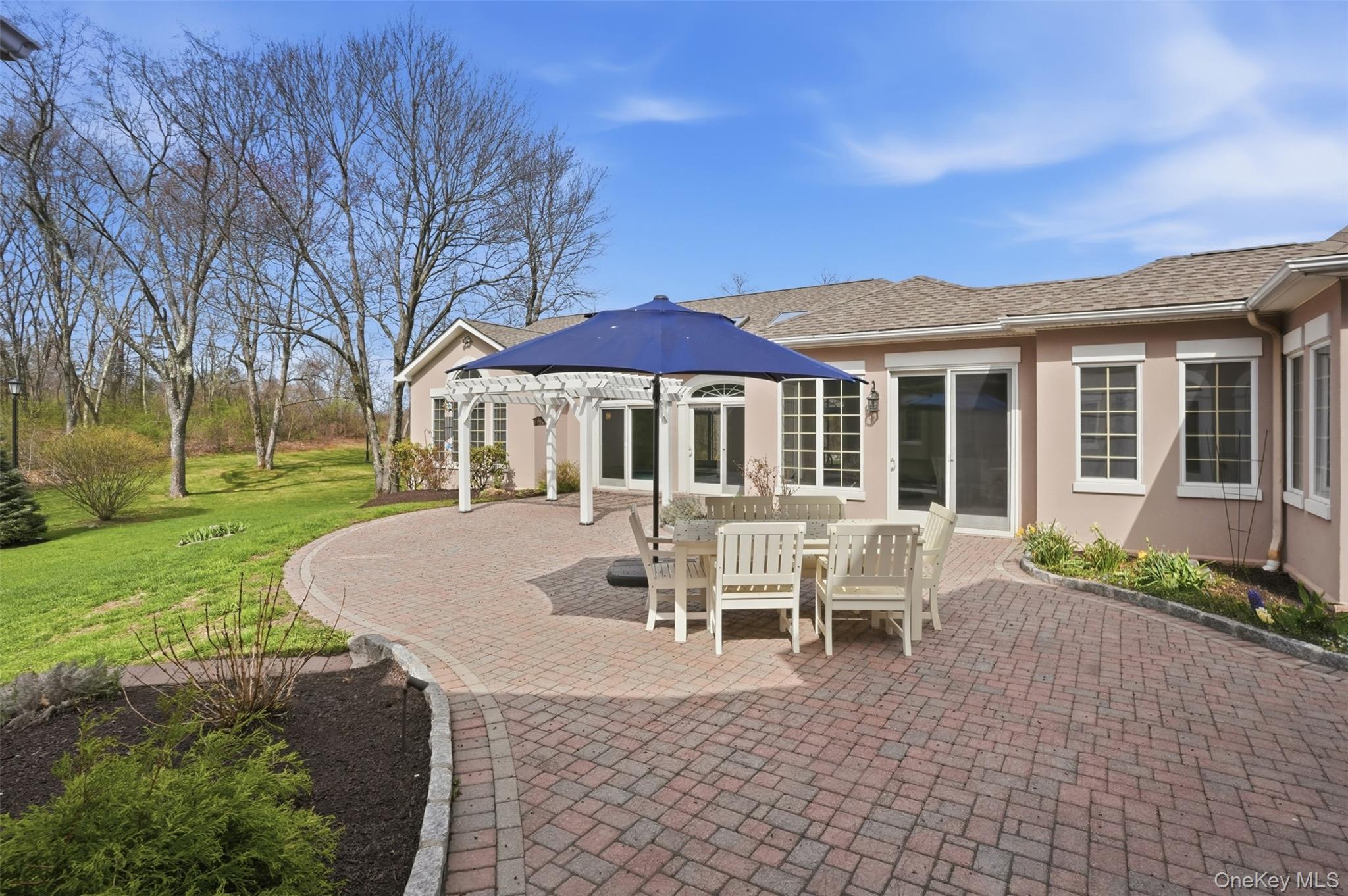 17 Forrest Way Poughkeepsie, NY 12603 - Photo 30 of 50 a house view with a seating space and garden