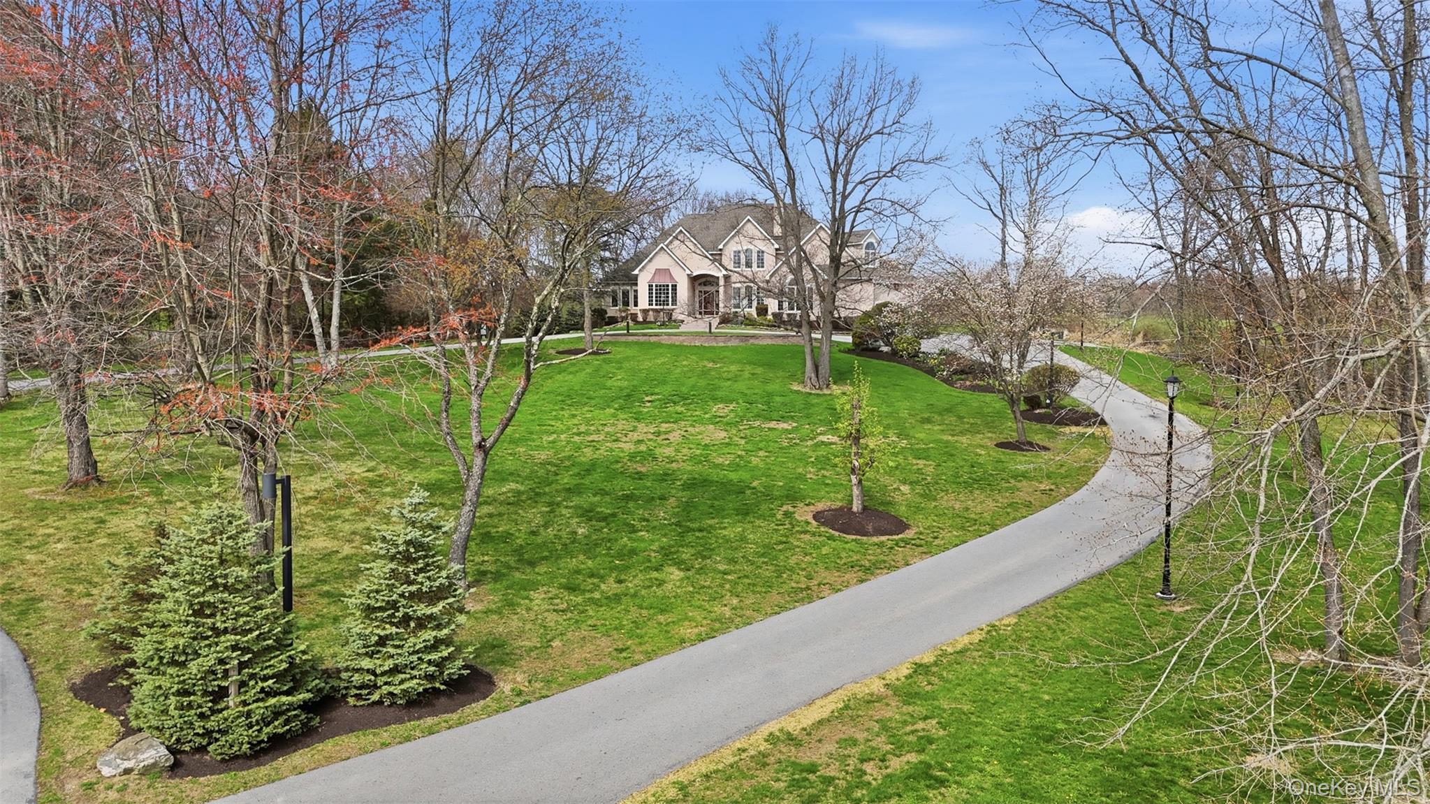 17 Forrest Way Poughkeepsie, NY 12603 - Photo 4 of 50 a view of a garden with an outdoor space