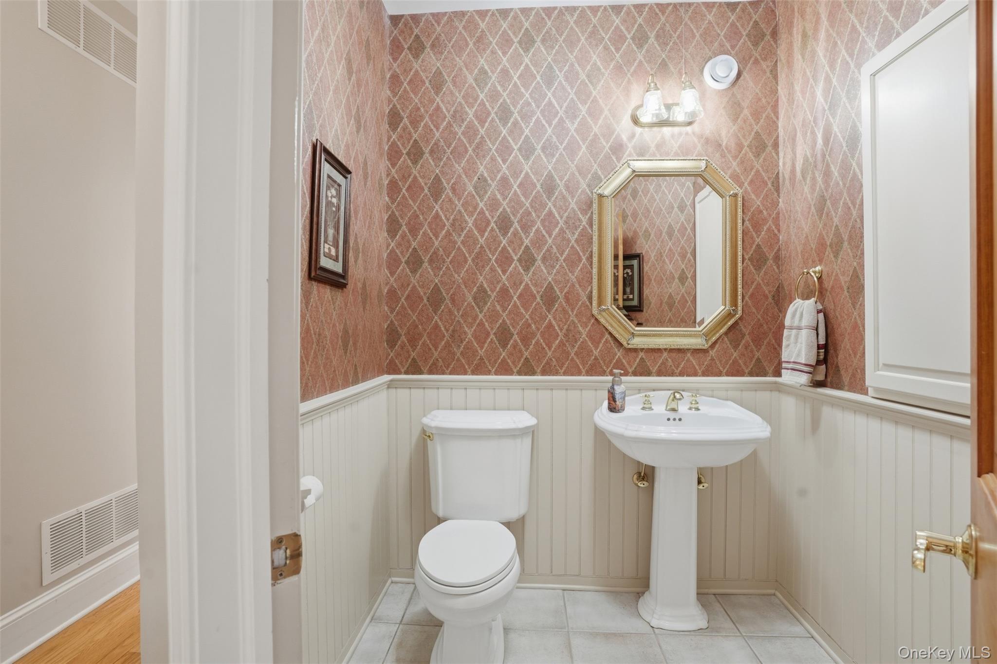17 Forrest Way Poughkeepsie, NY 12603 - Photo 42 of 50 a bathroom with a toilet sink and mirror