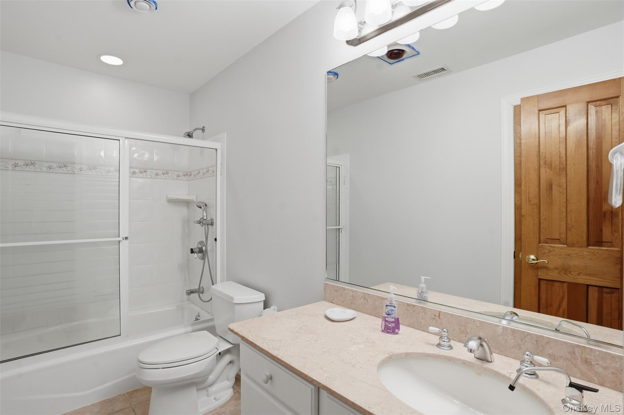 17 Forrest Way Poughkeepsie, NY 12603 - Photo 43 of 50 a bathroom with a sink toilet and shower