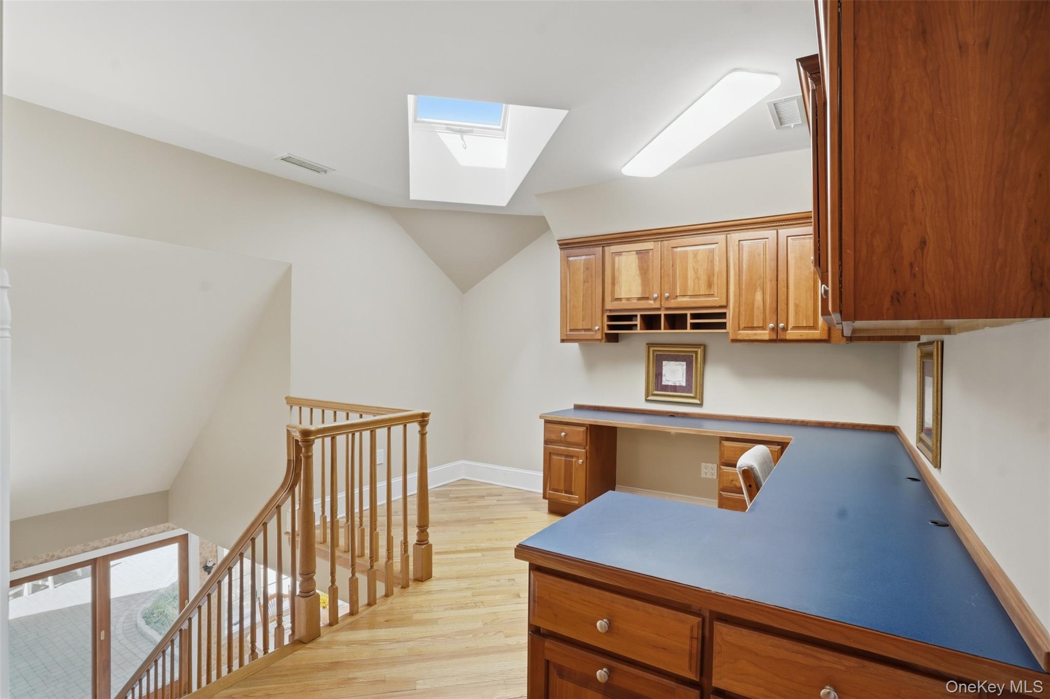 17 Forrest Way Poughkeepsie, NY 12603 - Photo 45 of 50 a kitchen with stainless steel appliances granite countertop a sink dishwasher stove and microwave with wooden floor