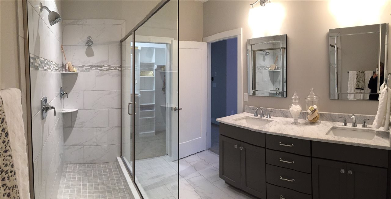 840 The Village Circle Raleigh, NC 27615 - Photo 11 of 17 Photo is from Gephart Hill's 2015 Parade of Homes winning entry. Selections may defer in available townhomes. Master Bath/Spa