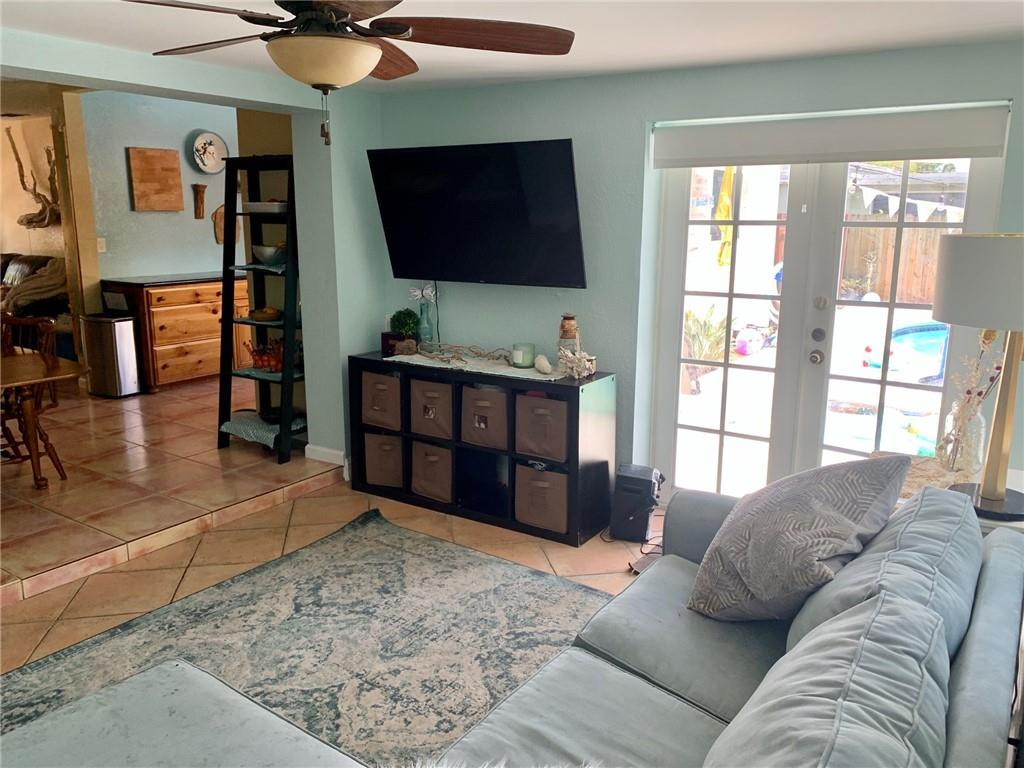 1101 Southwest 1st Avenue Pompano Beach, FL 33060 - Photo 13 of 30 a living room with furniture and a flat screen tv