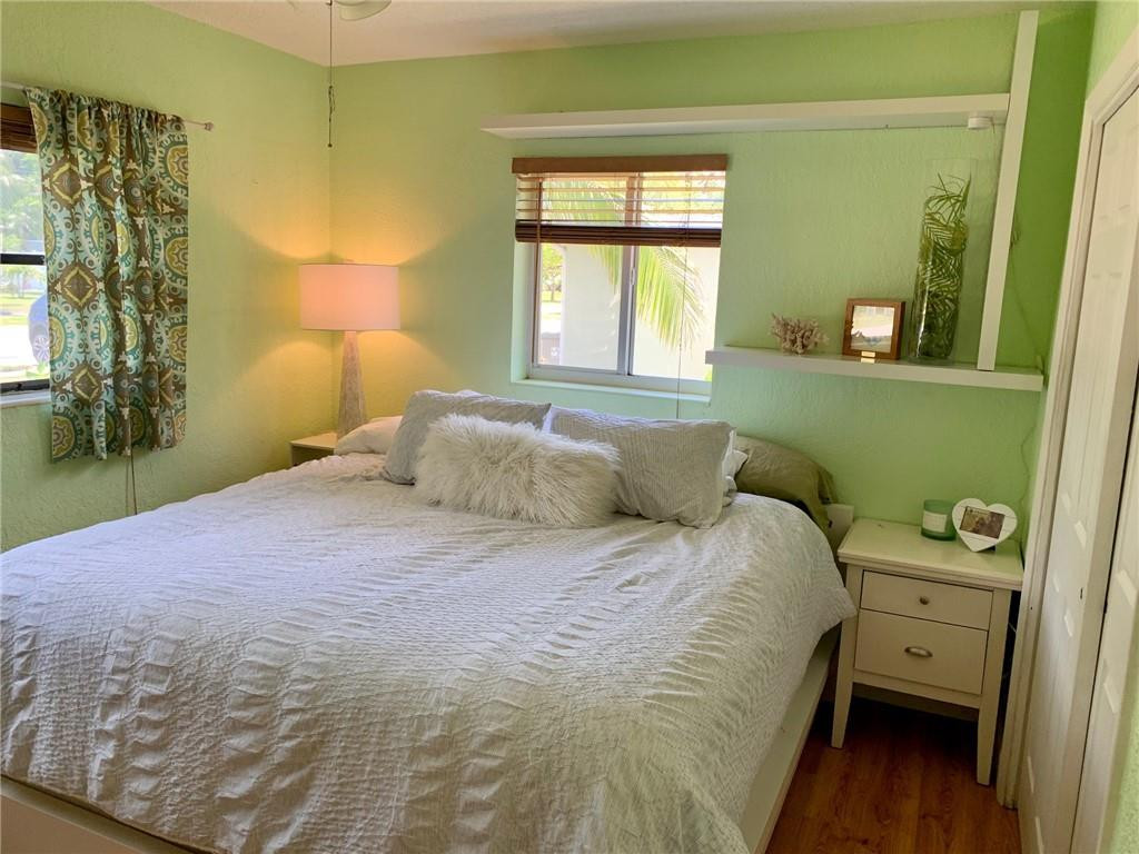 1101 Southwest 1st Avenue Pompano Beach, FL 33060 - Photo 16 of 30 a bedroom with a bed and a window