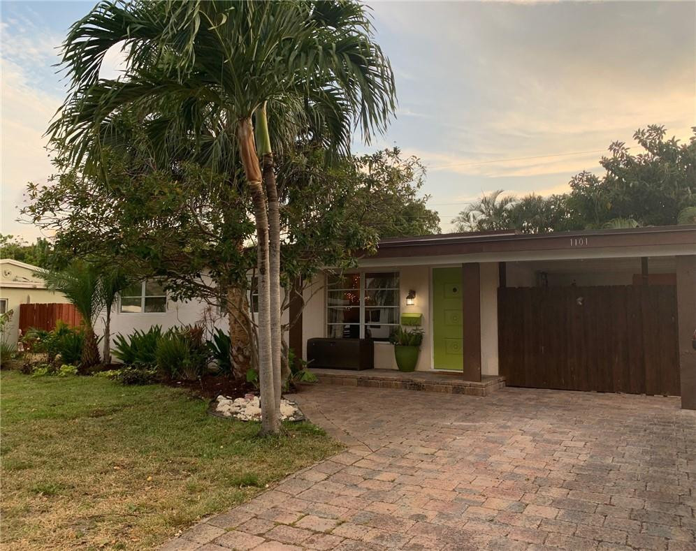 1101 Southwest 1st Avenue Pompano Beach, FL 33060 - Photo 2 of 30 a view of a house with a yard