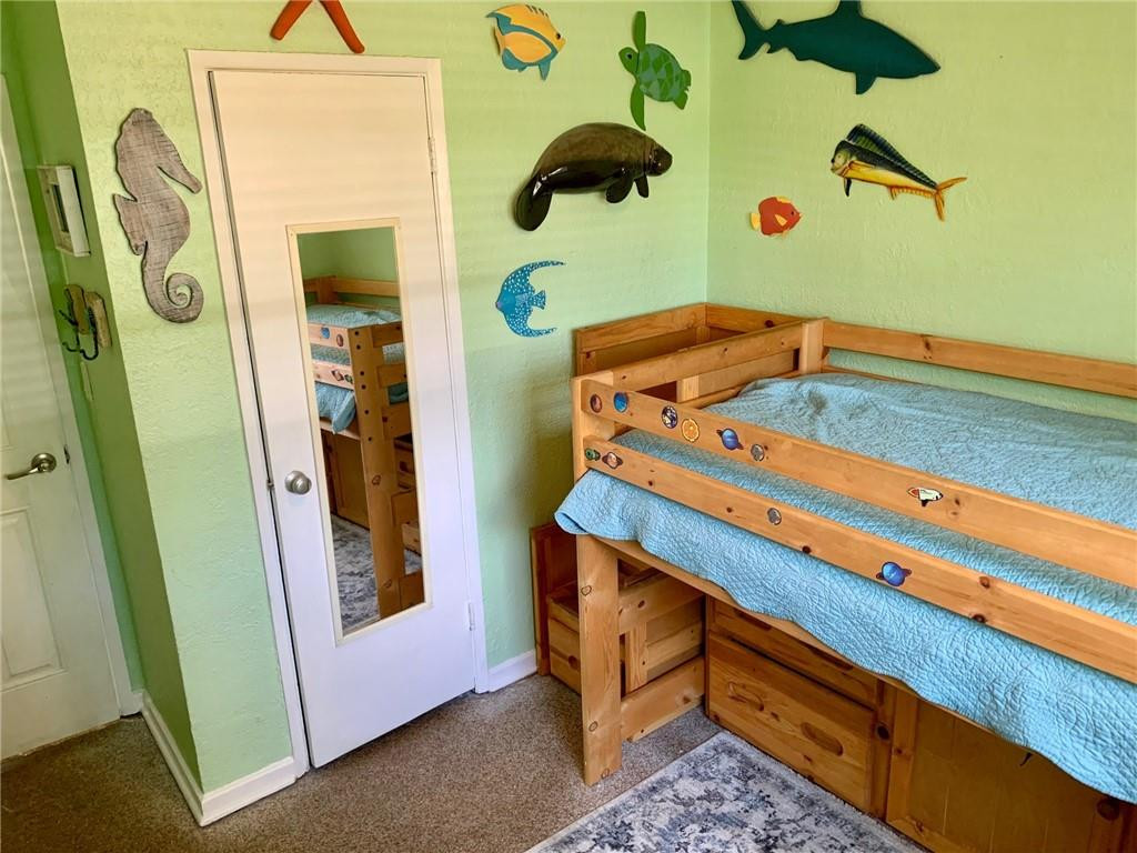 1101 Southwest 1st Avenue Pompano Beach, FL 33060 - Photo 21 of 30 a bed room with a bed and a window