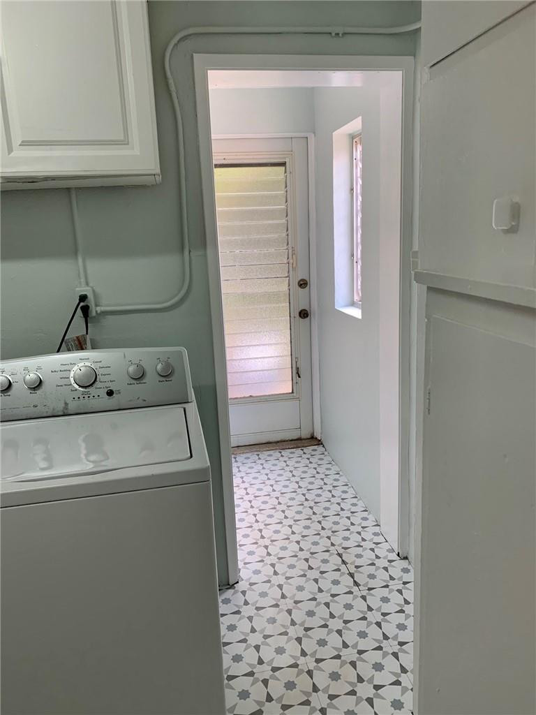 1101 Southwest 1st Avenue Pompano Beach, FL 33060 - Photo 25 of 30 a utility room with dryer and washer