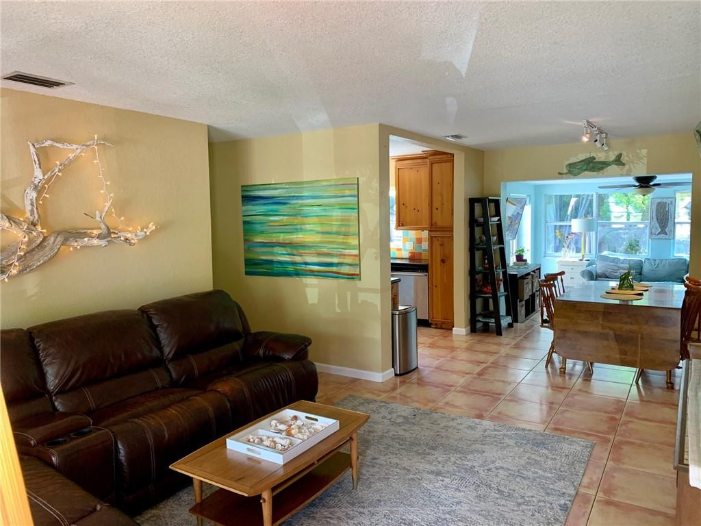 1101 Southwest 1st Avenue Pompano Beach, FL 33060 - Photo 5 of 30 a living room with furniture and a wooden floor