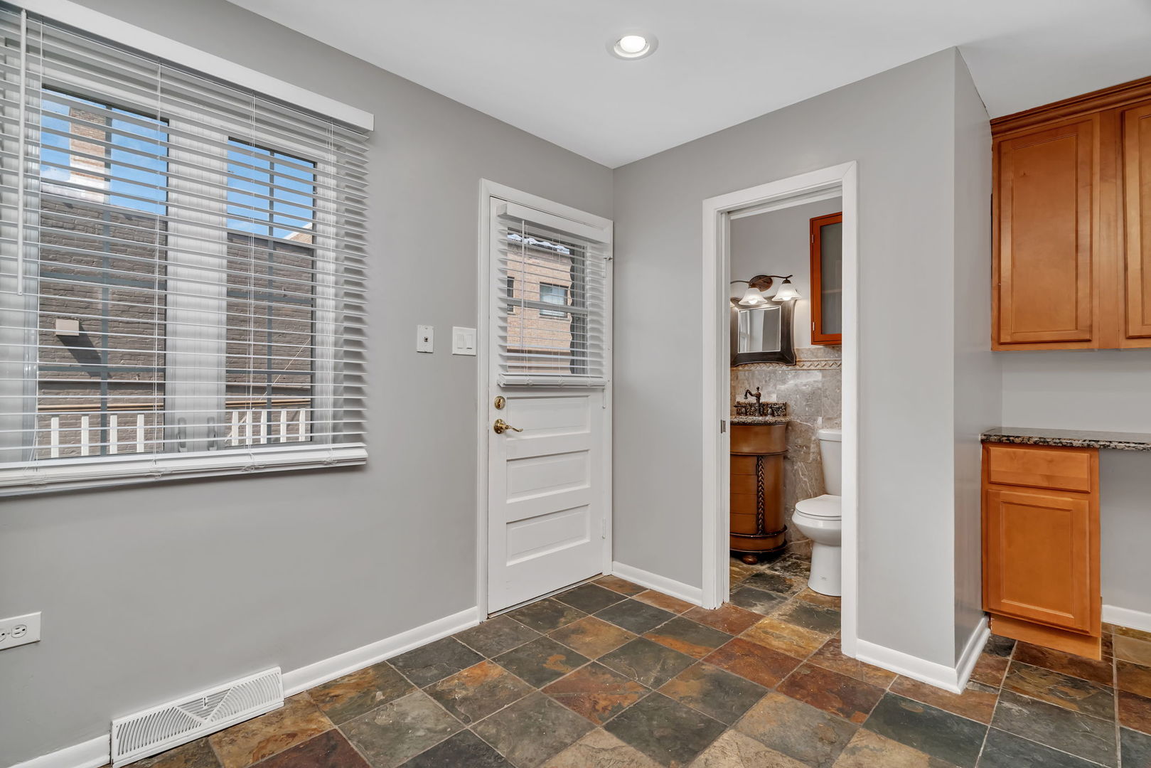 13 South Waiola Avenue, Unit 5 La Grange, IL 60525 - Photo 7 of 22 a view of room with window and cabinet