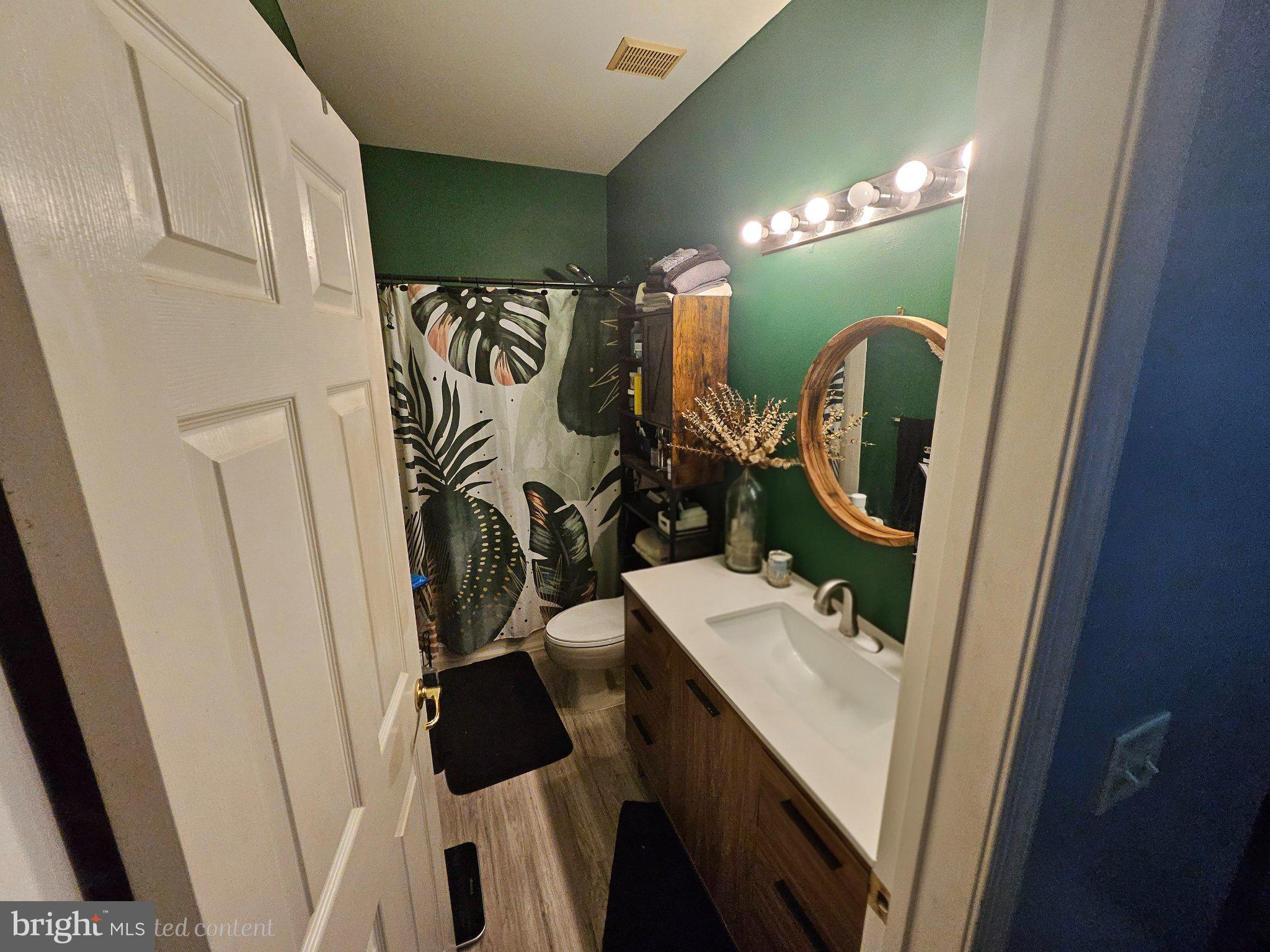 83 Kyle Way Ewing, NJ 08628 - Photo 18 of 36 Chic bathroom with vibrant accents.