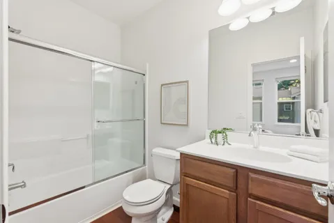a view of a hallway with washer and dryer