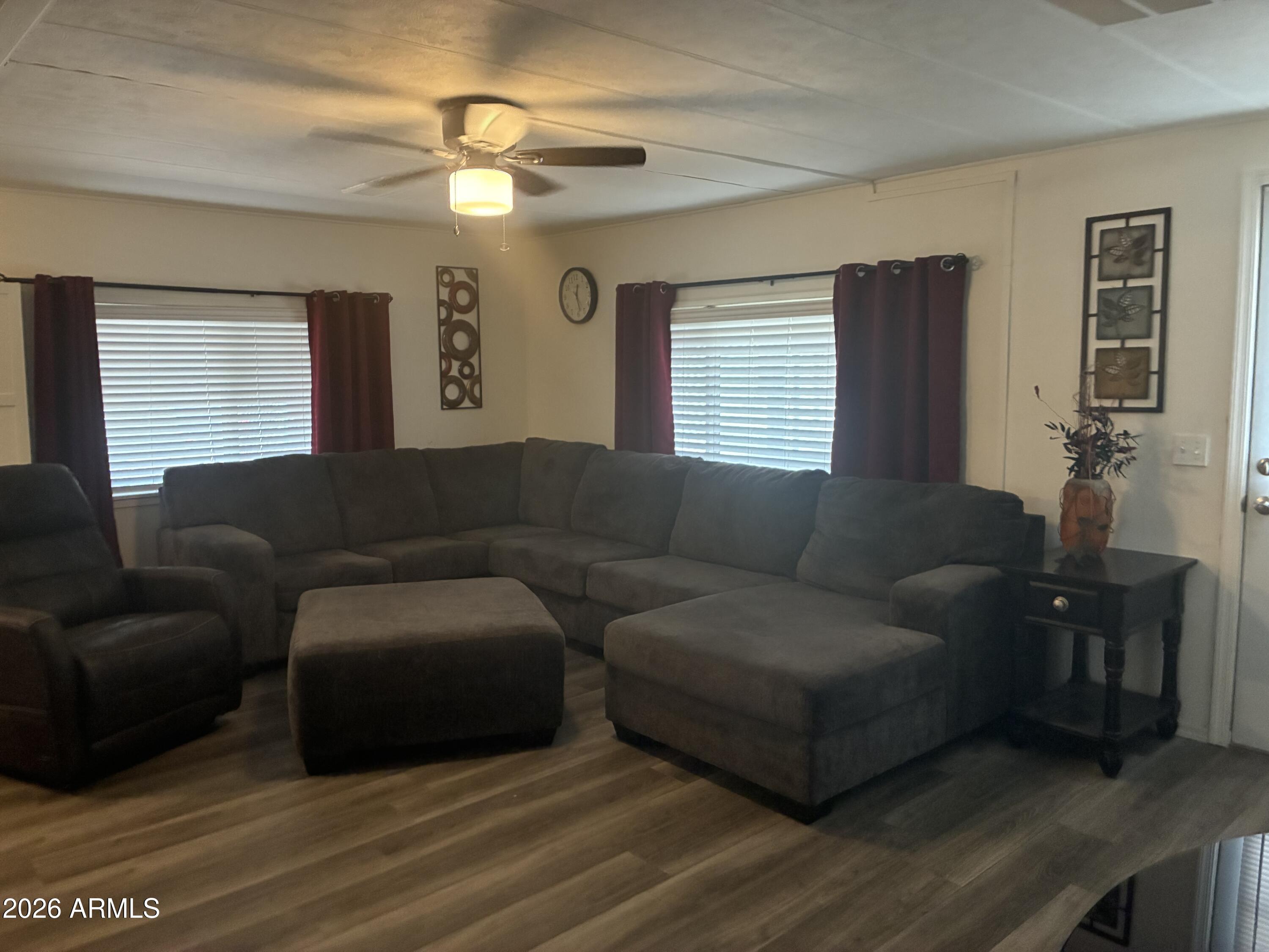 53 North Mountain Road, Unit 58 Apache Junction, AZ 85120 - Photo 4 of 39 a living room with furniture and a window