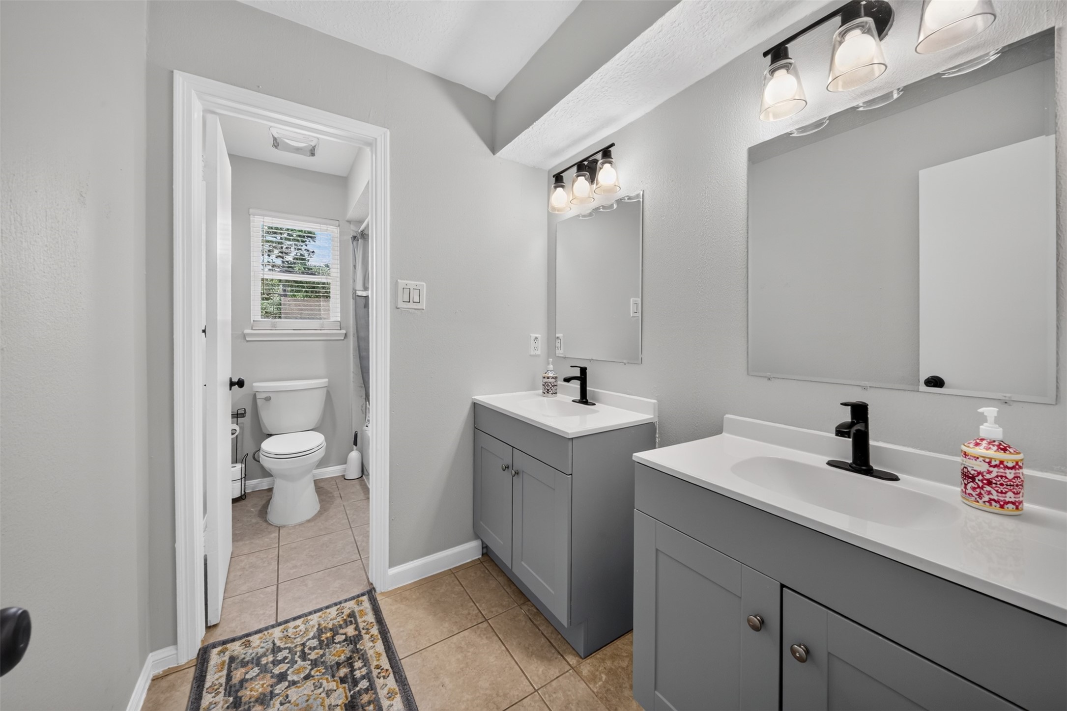 5211 Nodaway Lane Spring, TX 77379 - Photo 27 of 41 Full Bathroom on 2nd level features separate Vanity and Shower areas.