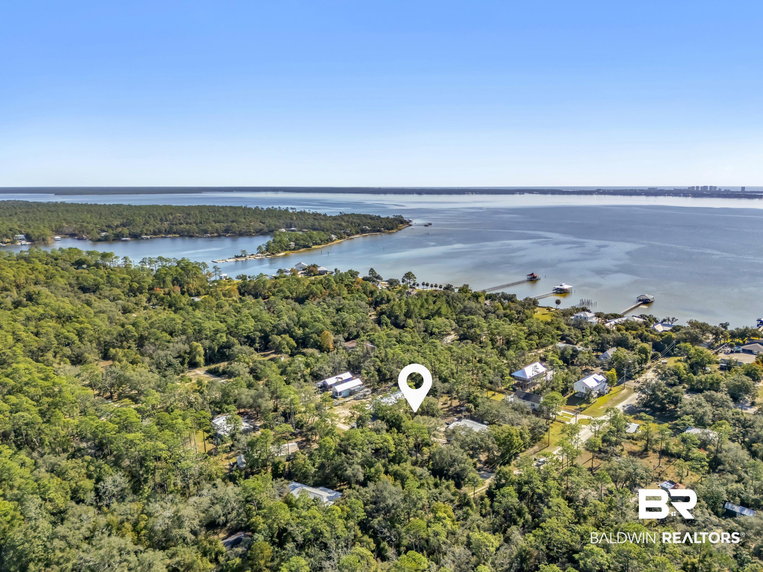 Pine Street Elberta, AL 36530 - Photo 2 of 13 Drone / aerial view of a forest and a large body of water