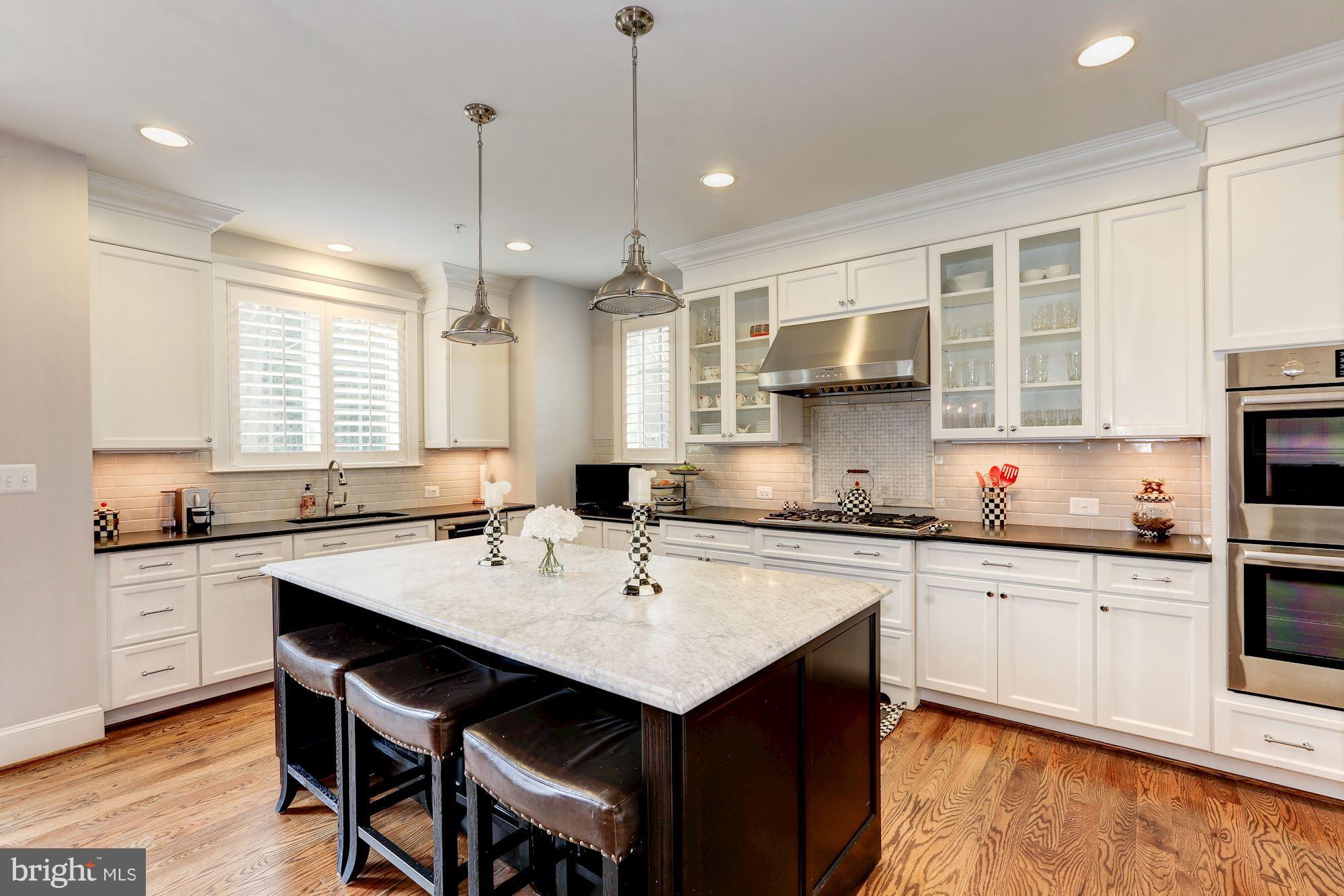 8919 Ridge Place Bethesda, MD 20817 - Photo 12 of 30 Gourmet Kitchen with double oven, gas range w/hood