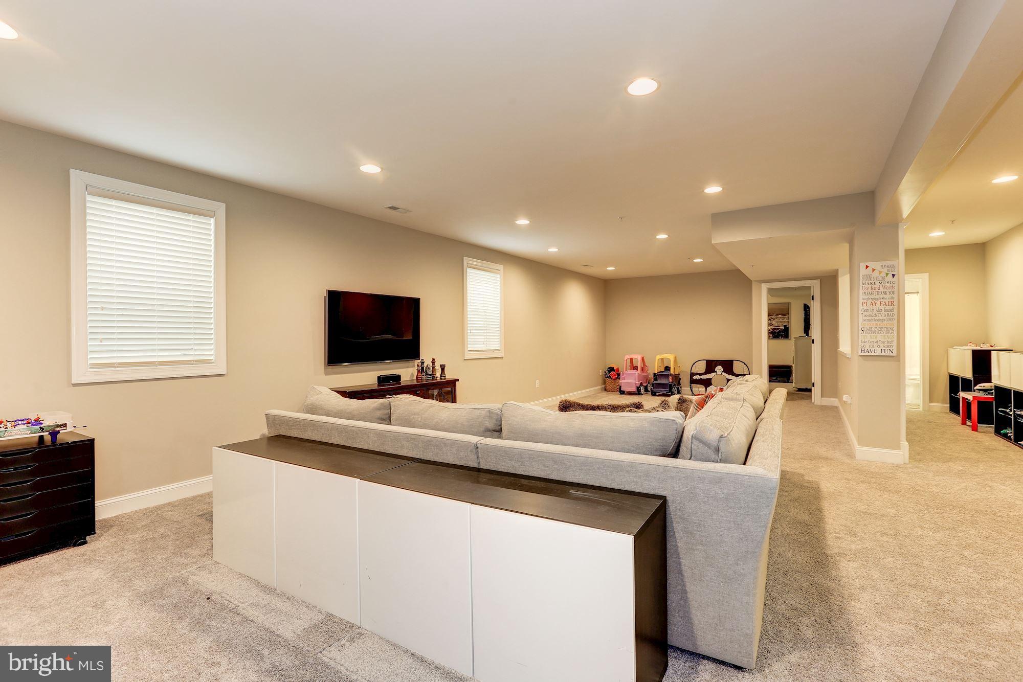 8919 Ridge Place Bethesda, MD 20817 - Photo 25 of 30 Open carpeted Basement