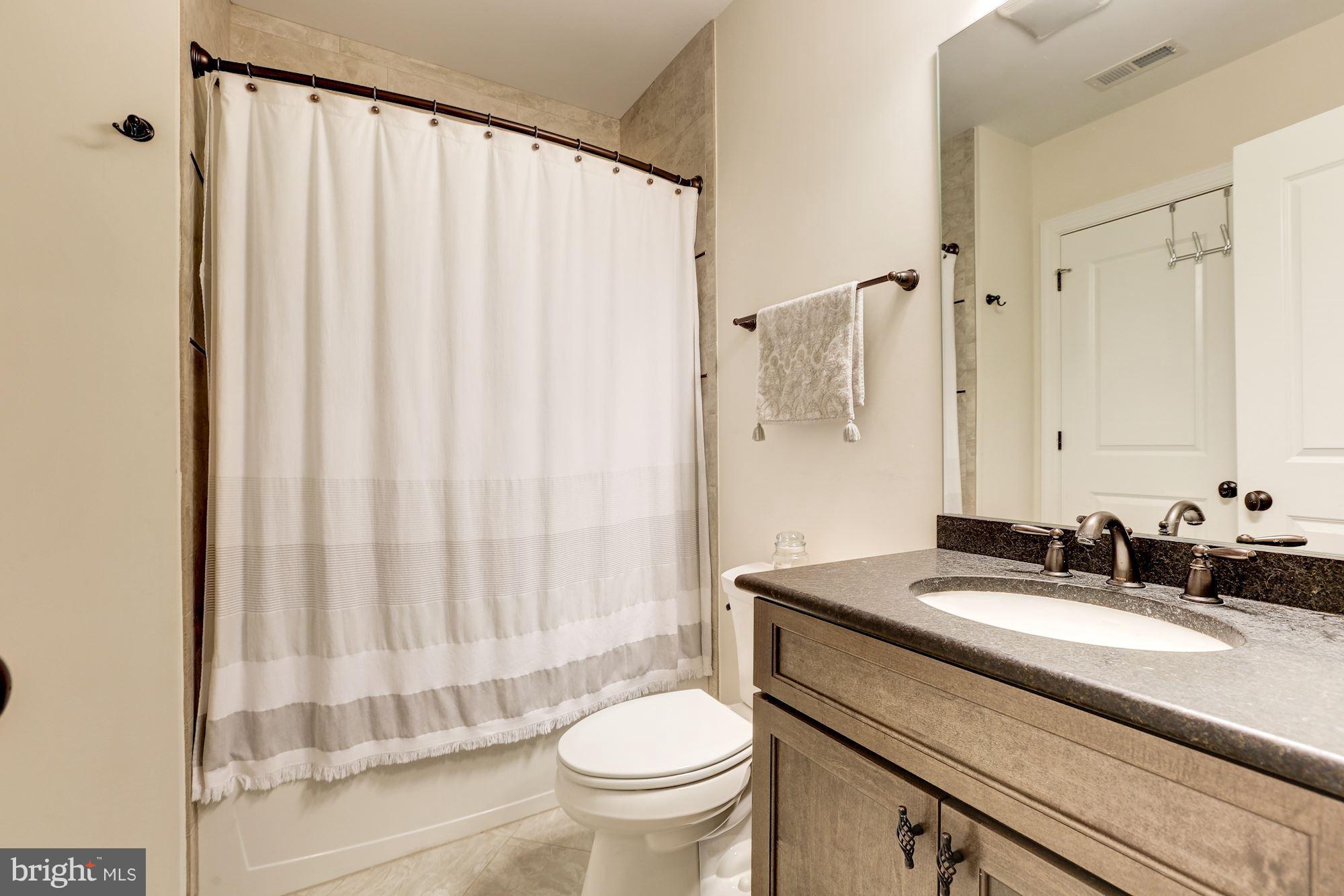 8919 Ridge Place Bethesda, MD 20817 - Photo 26 of 30 Basement full bathroom