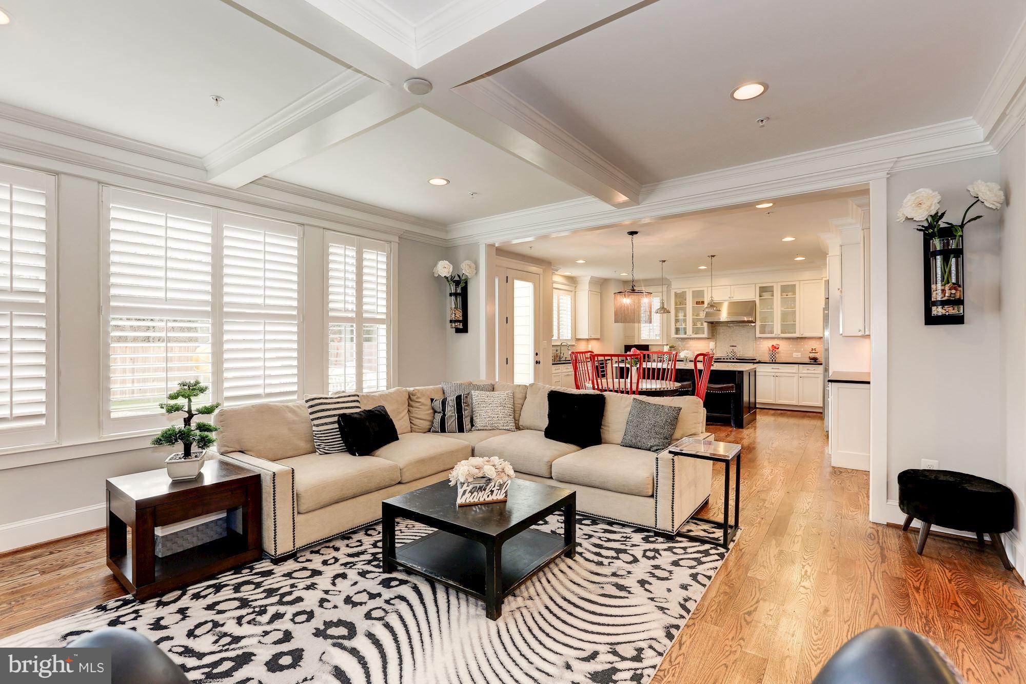 8919 Ridge Place Bethesda, MD 20817 - Photo 7 of 30 Family room with plantation shutters